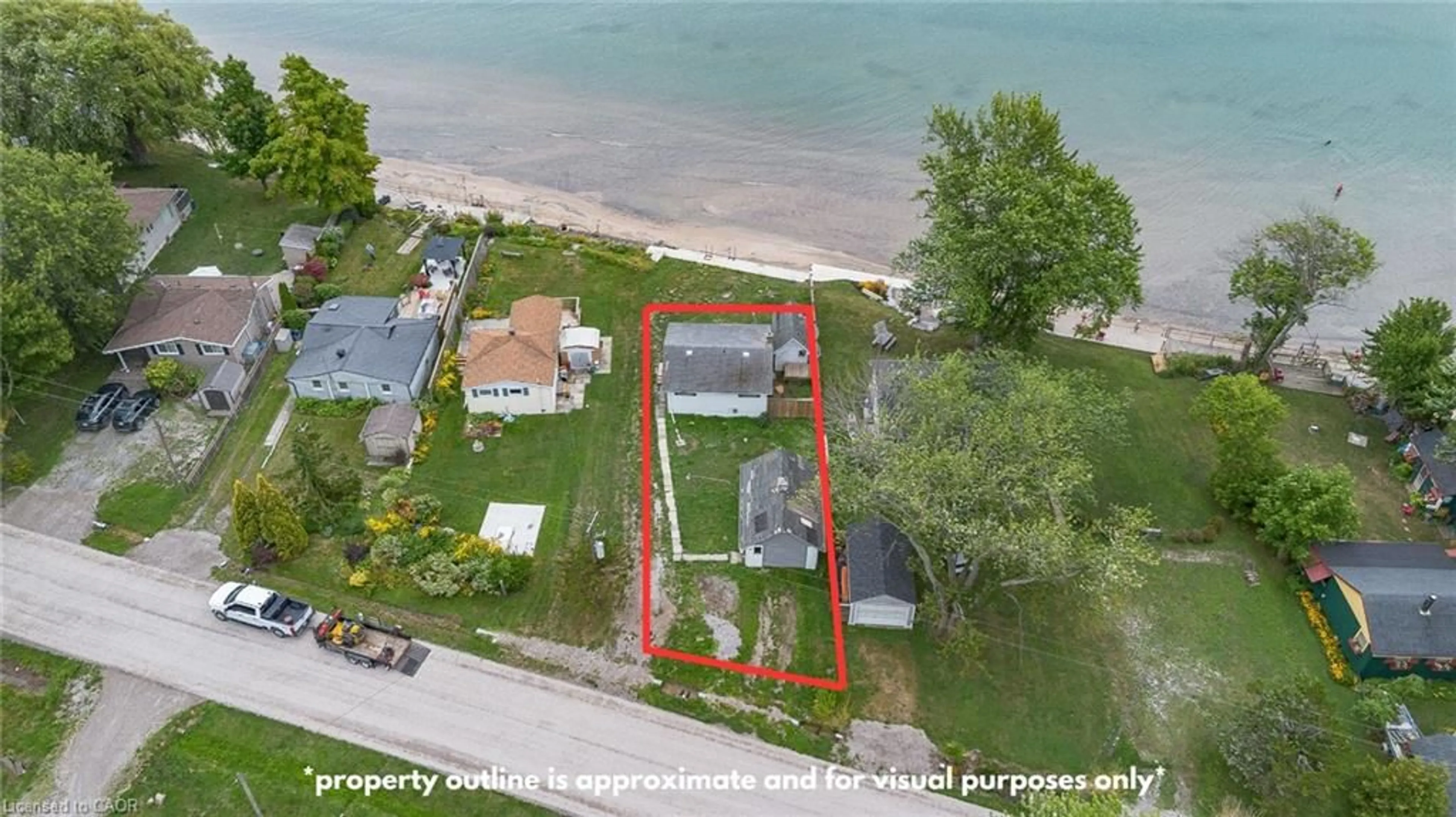 A pic from outside/outdoor area/front of a property/back of a property/a pic from drone, water/lake/river/ocean view for 2580 Lakeshore Road, Cayuga Ontario N1A 2W8