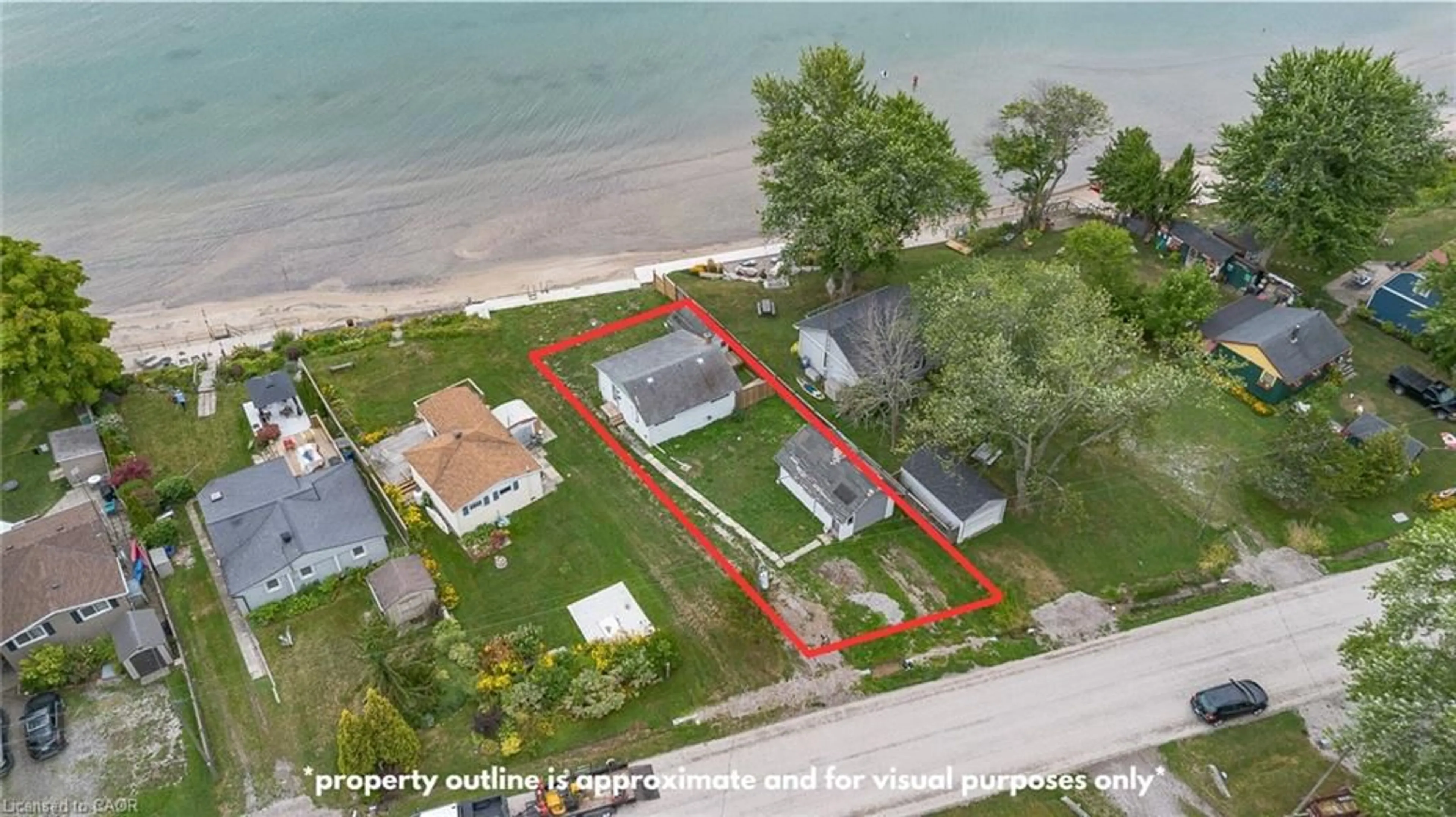 A pic from outside/outdoor area/front of a property/back of a property/a pic from drone, water/lake/river/ocean view for 2580 Lakeshore Road, Cayuga Ontario N1A 2W8