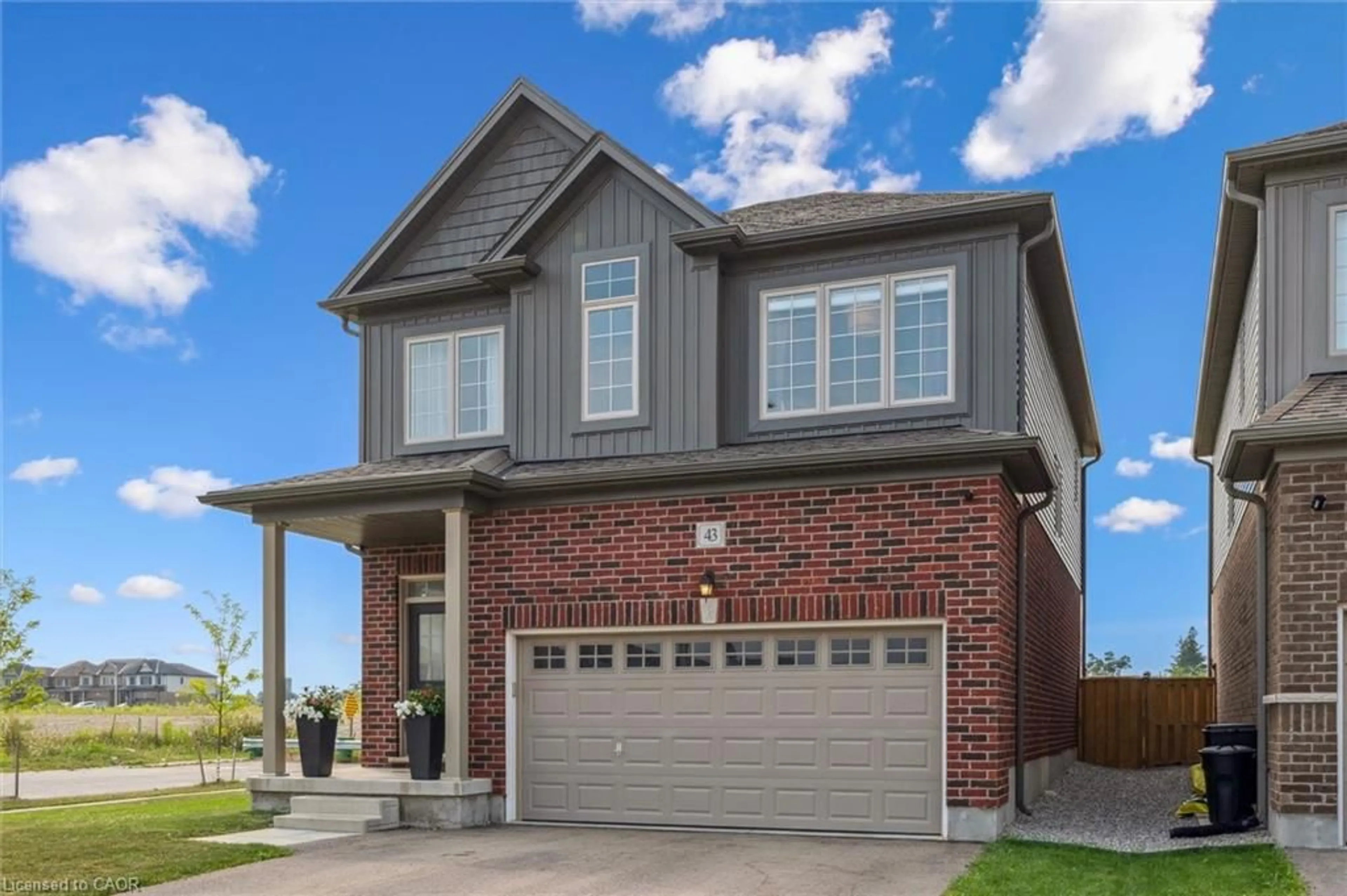 Home with brick exterior material, street for 43 Gourlay Farm Lane, Ayr Ontario N0B 1E0