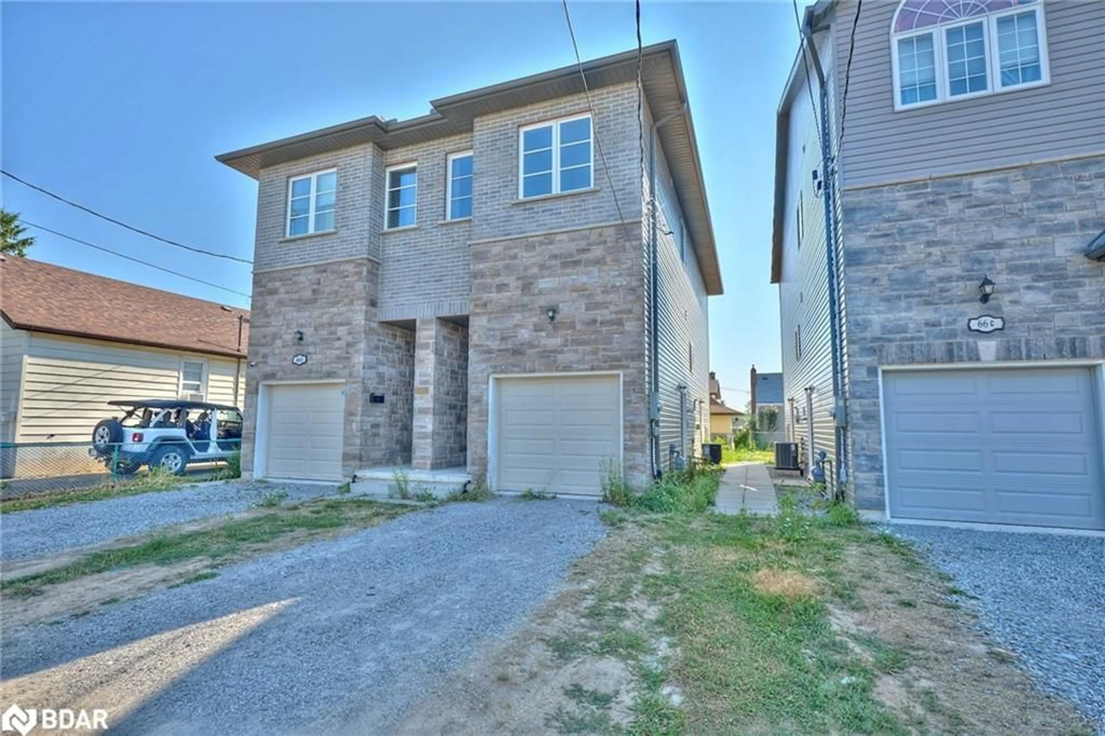 Home with brick exterior material, street for 66B Battle St, Thorold Ontario L2V 3W7
