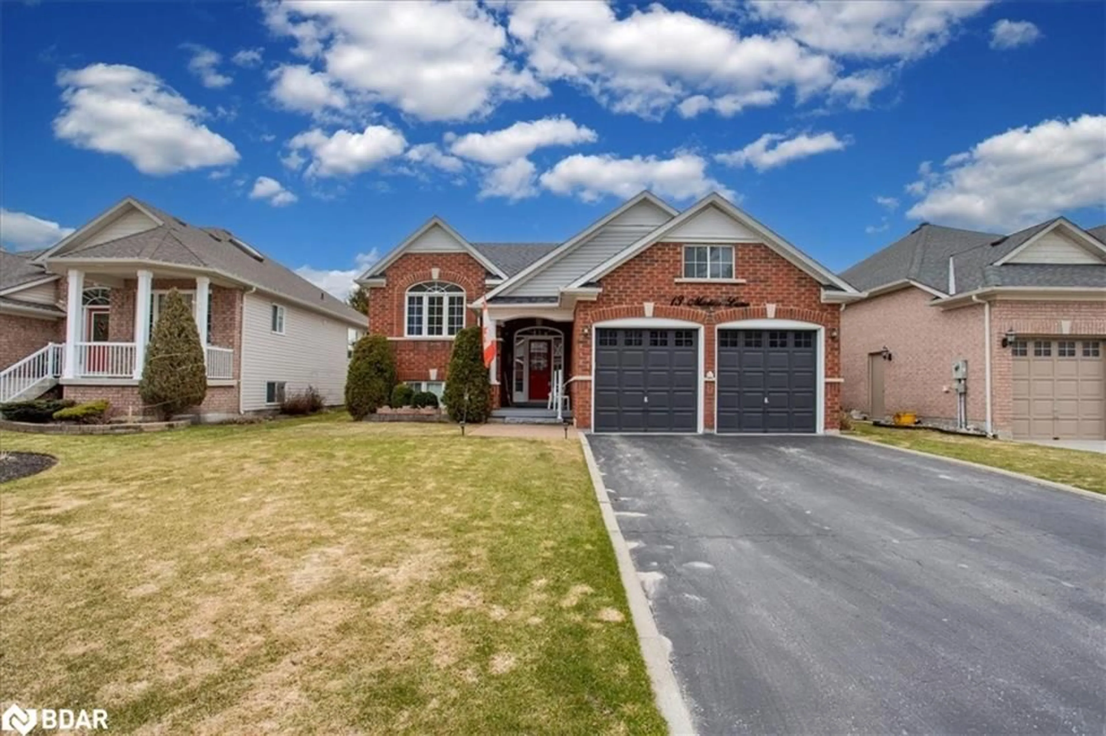 Home with brick exterior material, street for 13 Masters Lane, Wasaga Beach Ontario L9Z 1S9