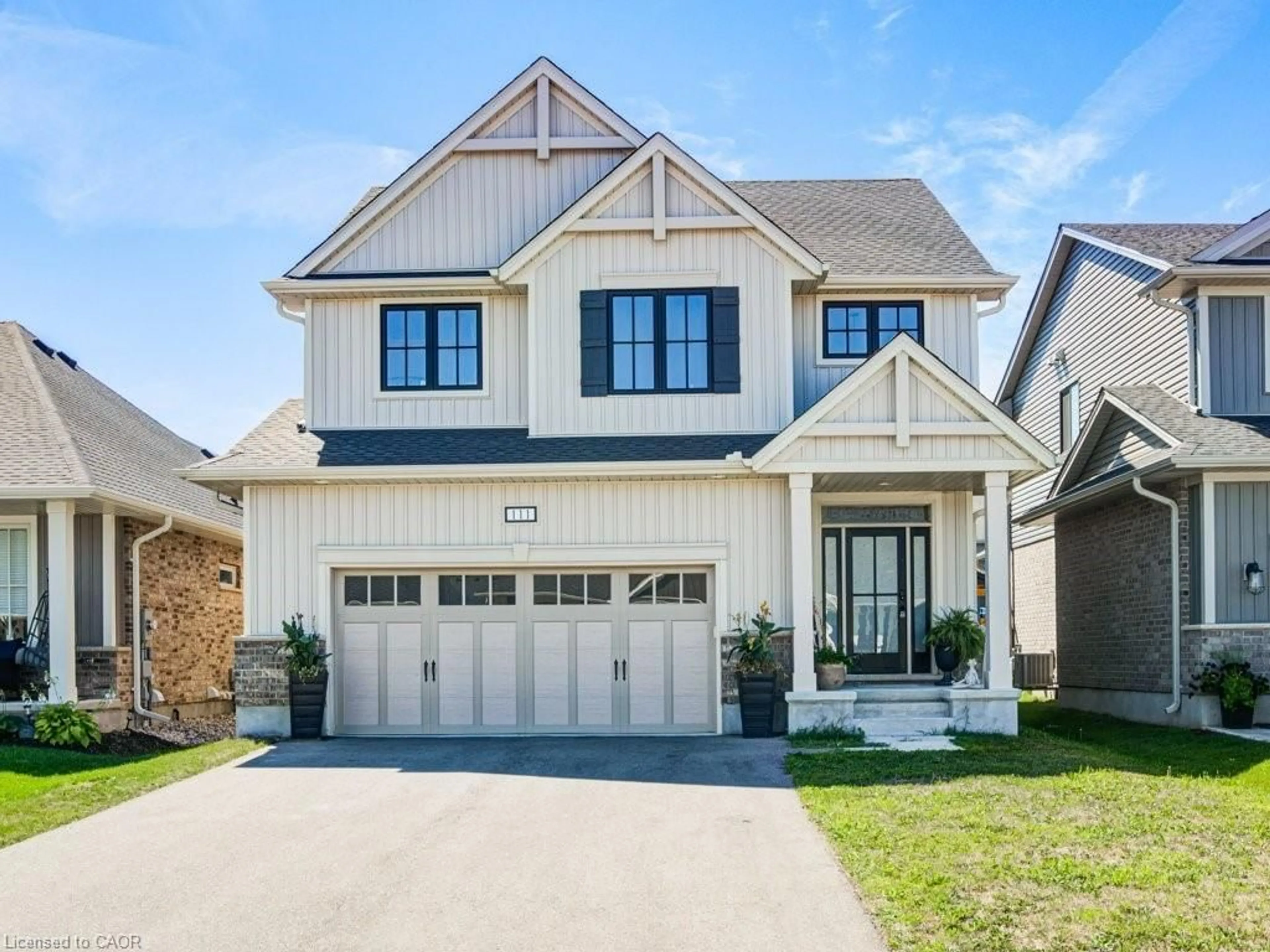Home with brick exterior material, street for 111 Livingston Dr, Tillsonburg Ontario N4G 0J3