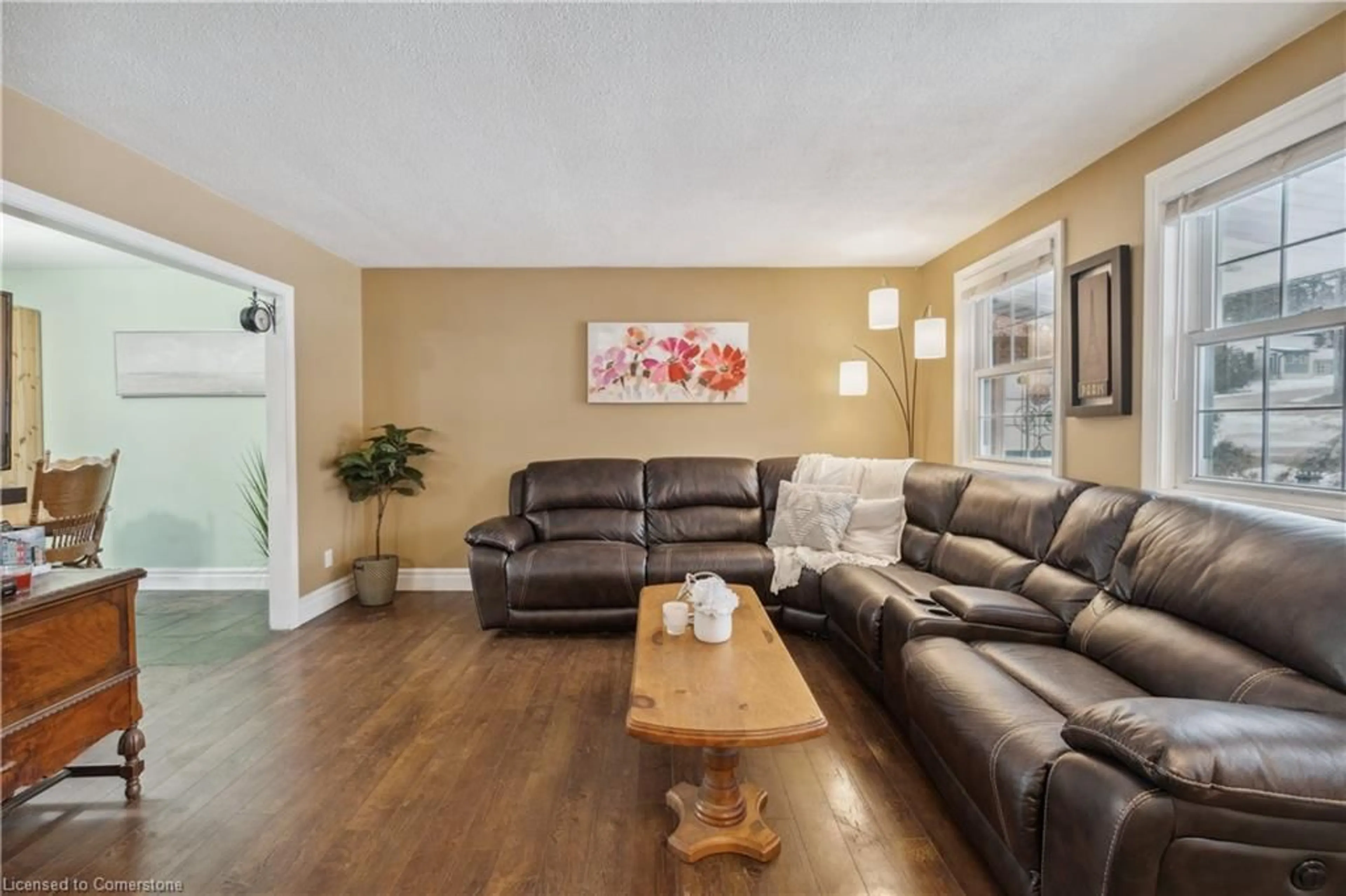 Living room with furniture, wood/laminate floor for 255 Main St #Main Floor Only, Rockwood Ontario N0B 2K0