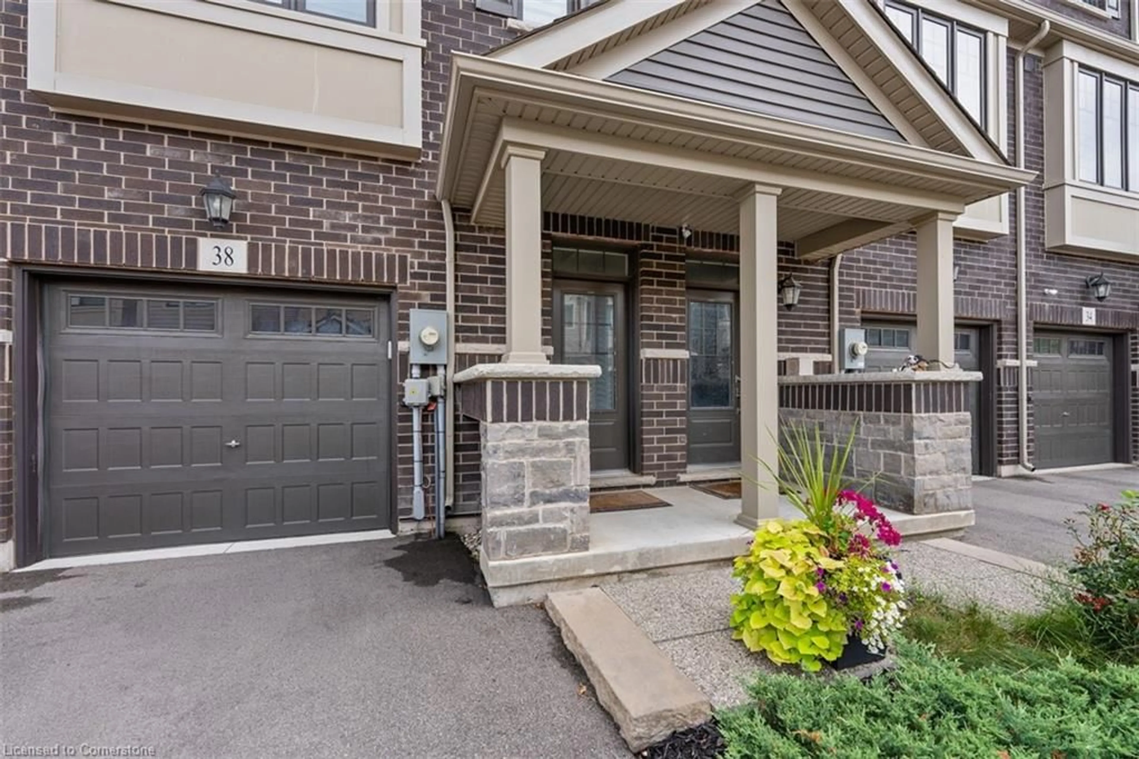 Home with brick exterior material, street for 38 Hibiscus Lane, Hamilton Ontario L8K 0A4
