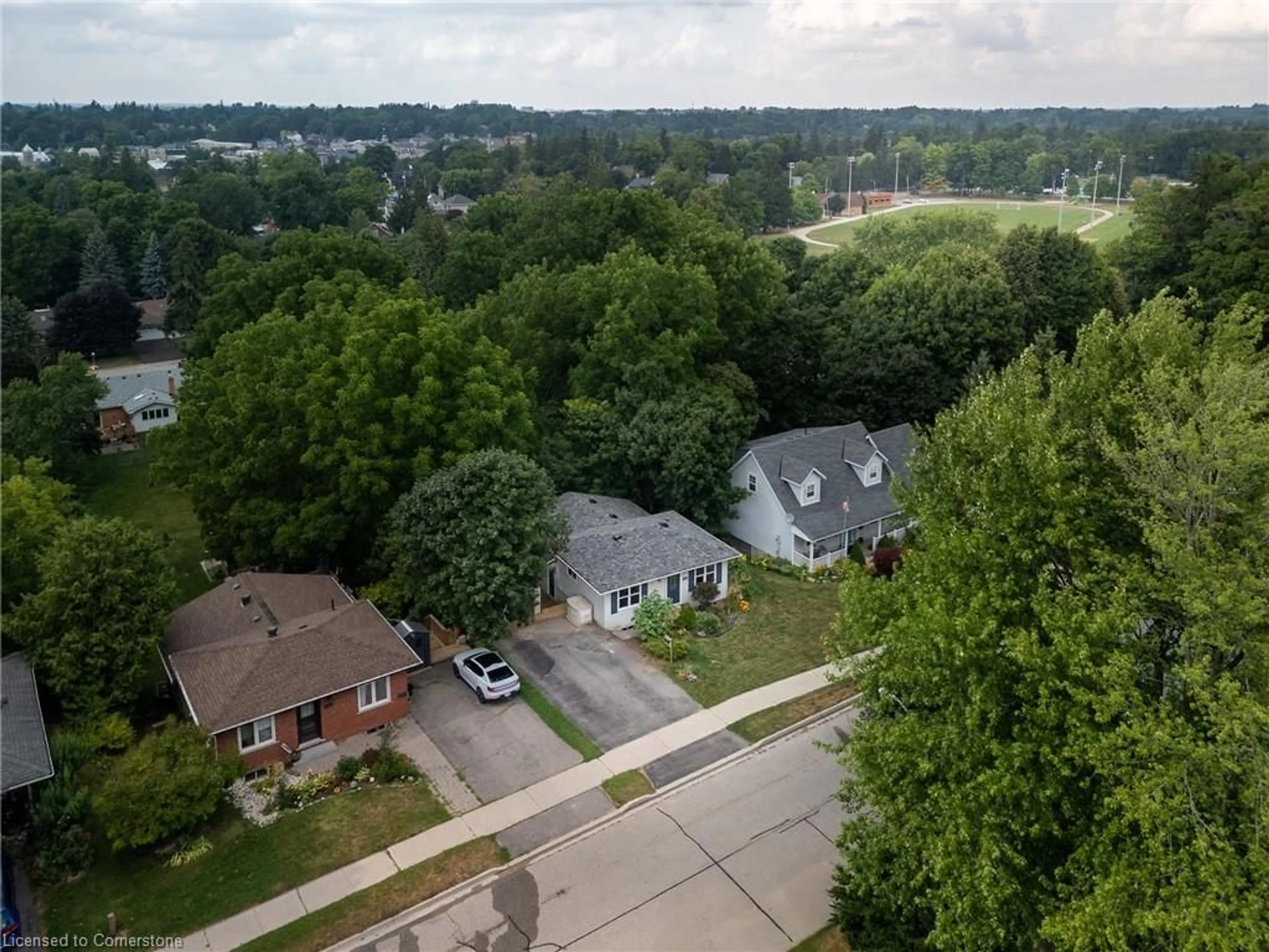 A pic from outside/outdoor area/front of a property/back of a property/a pic from drone, city buildings view from balcony for 209 Wellington St, Wellington Ontario N1M 3E1
