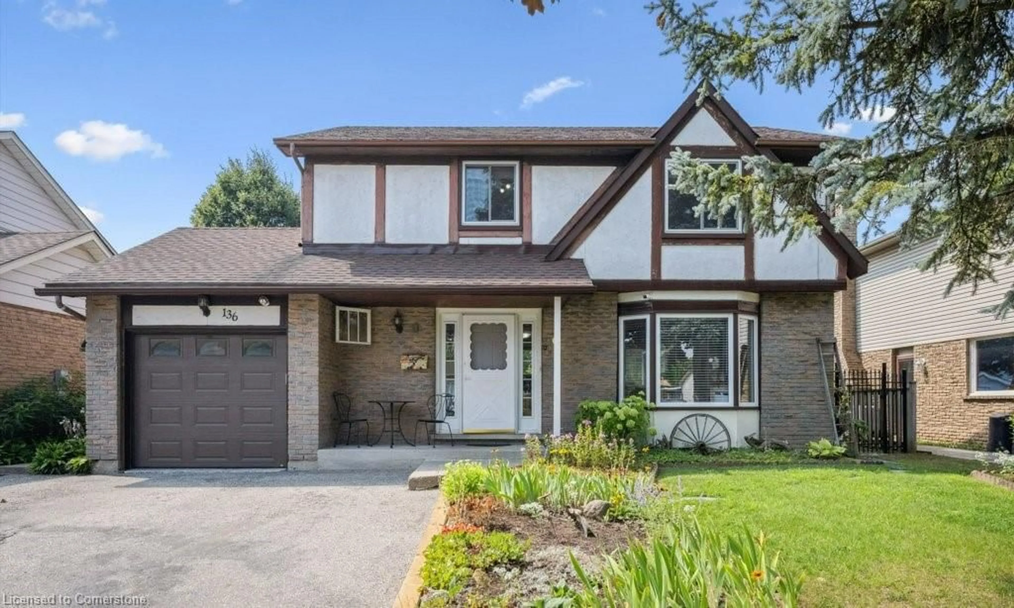 Home with brick exterior material, street for 136 St Jerome Cres, Kitchener Ontario N2C 2L2