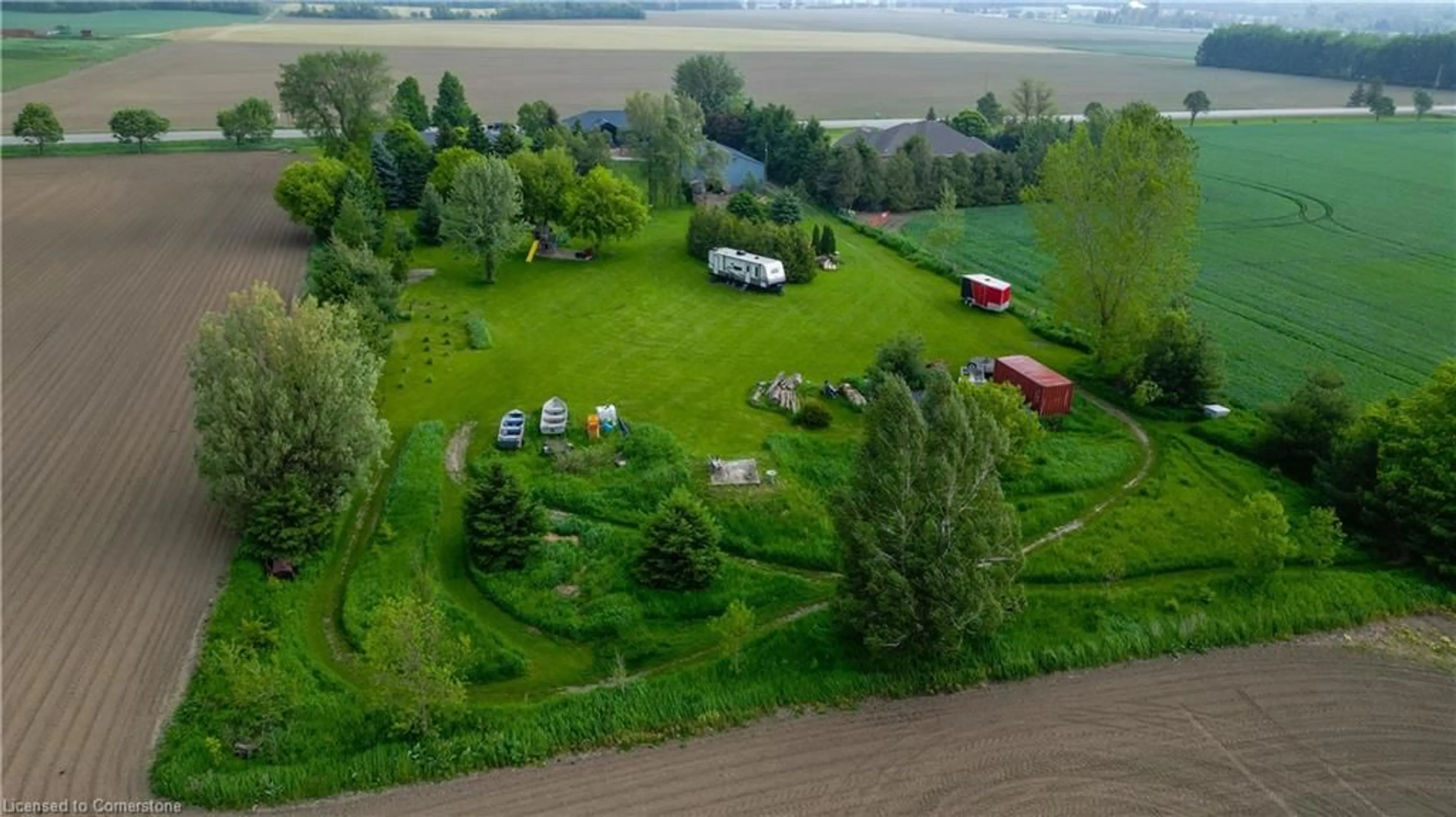 A pic from outside/outdoor area/front of a property/back of a property/a pic from drone, unknown for 7922 Wellington Road 8, Alma Ontario N0B 1A0