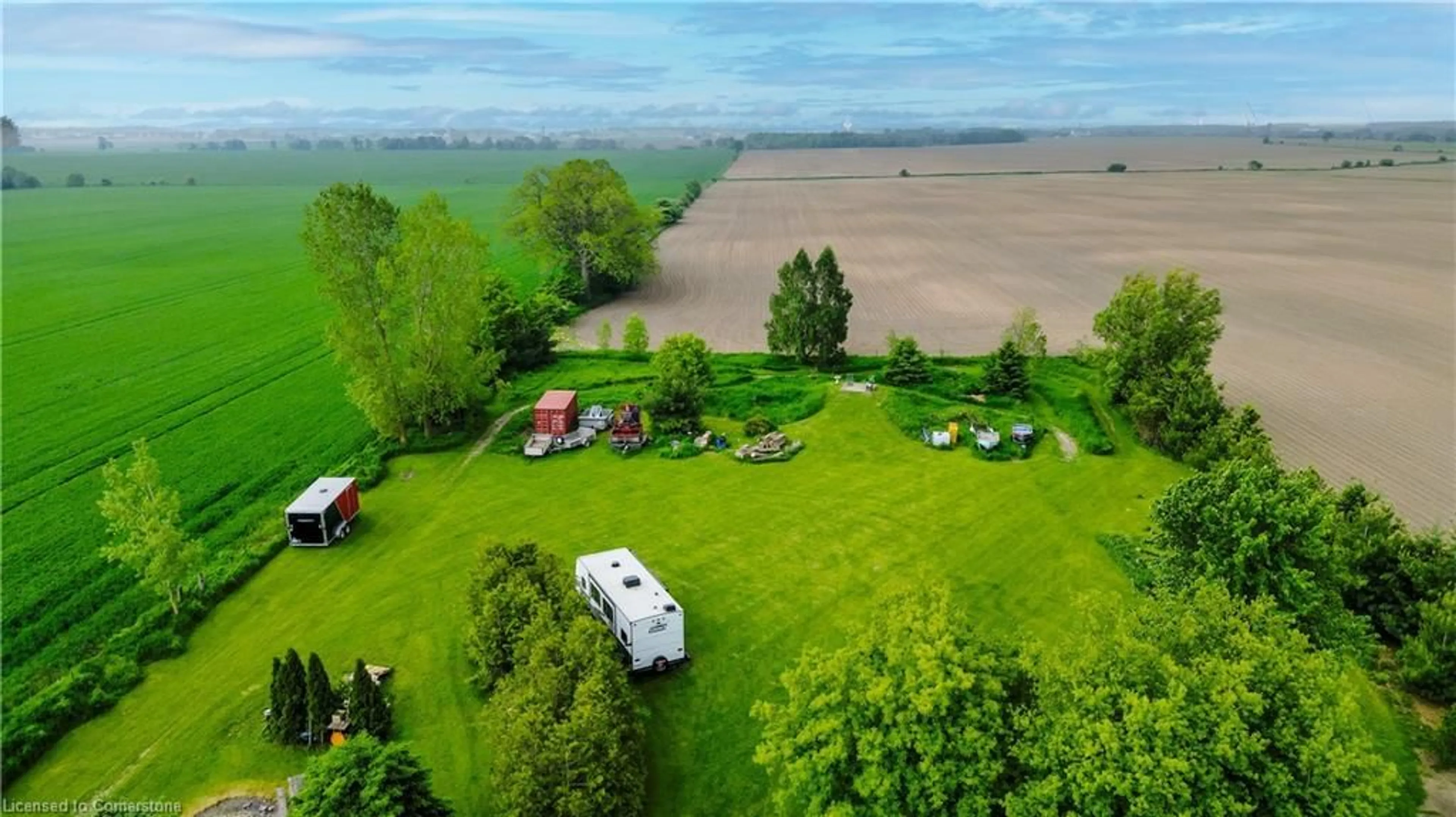 A pic from outside/outdoor area/front of a property/back of a property/a pic from drone, unknown for 7922 Wellington Road 8, Alma Ontario N0B 1A0
