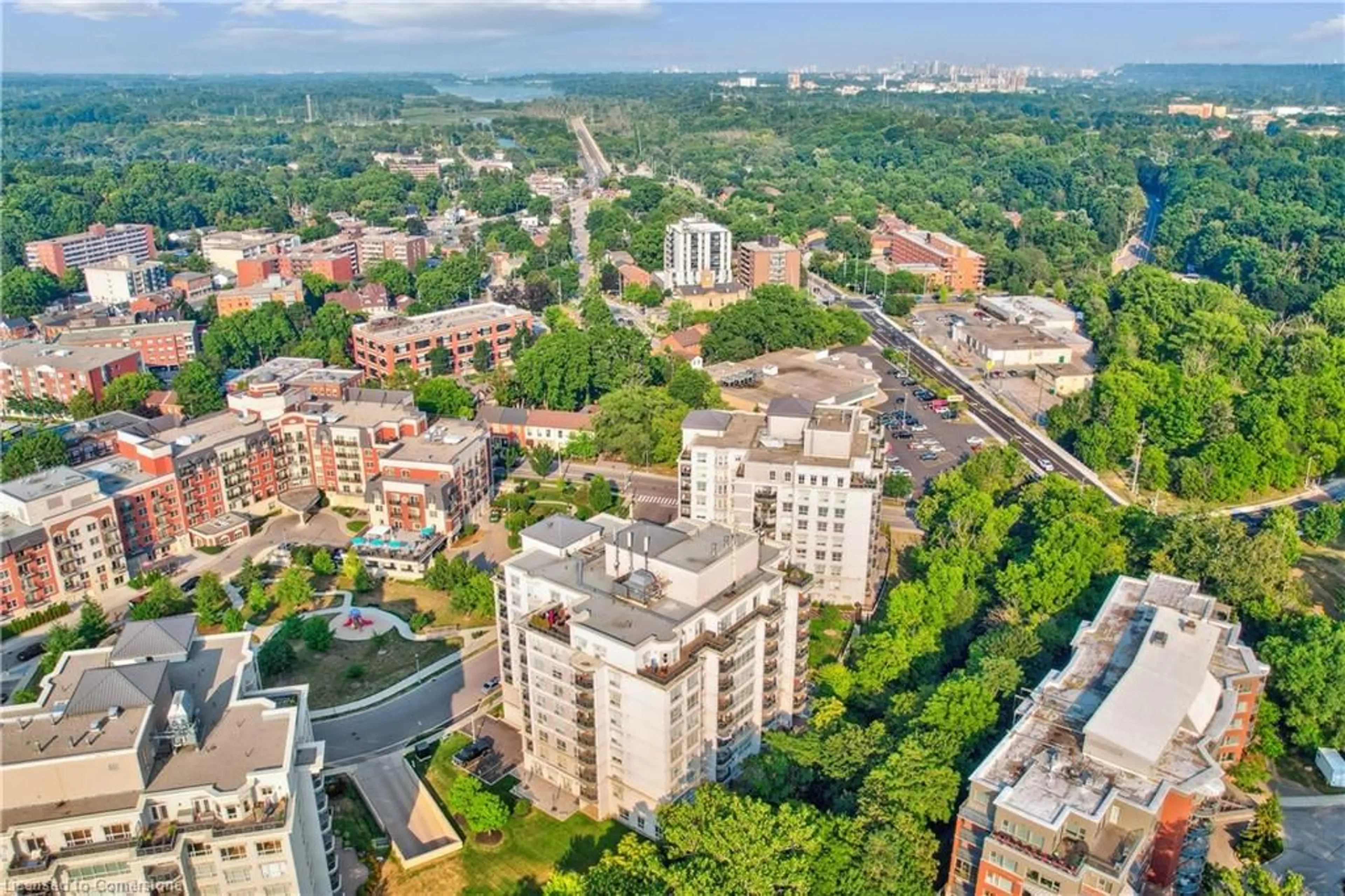 A pic from outside/outdoor area/front of a property/back of a property/a pic from drone, city buildings view from balcony for 2000 Creekside Dr #103, Hamilton Ontario L9H 7S7