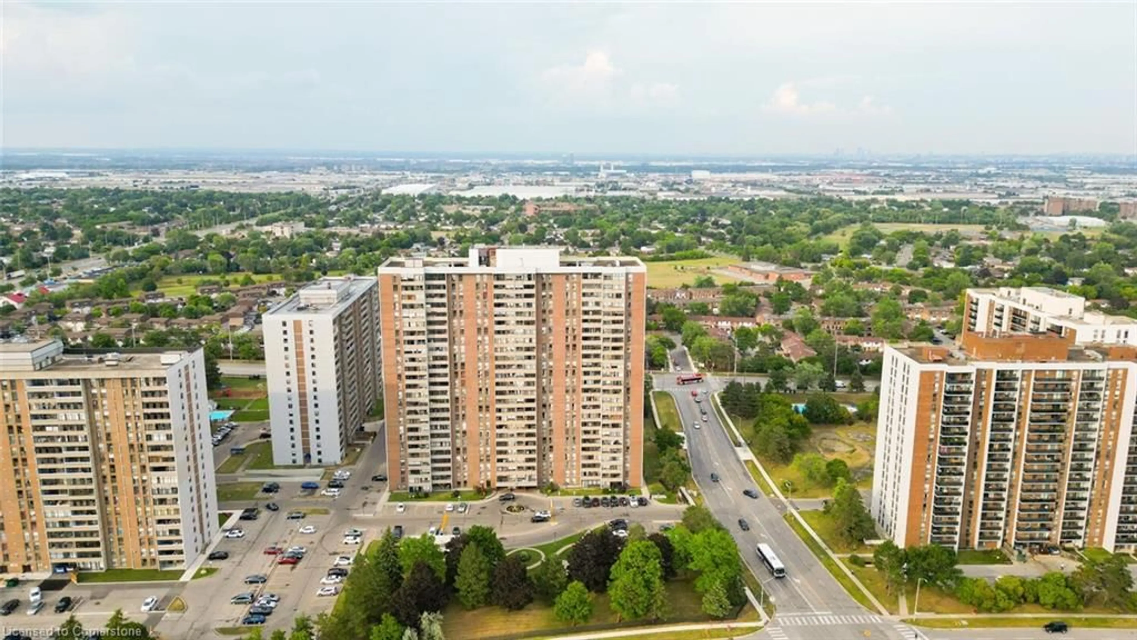 A pic from outside/outdoor area/front of a property/back of a property/a pic from drone, city buildings view from balcony for 18 Knightsbridge Rd #304, Peel Ontario L6T 3X5