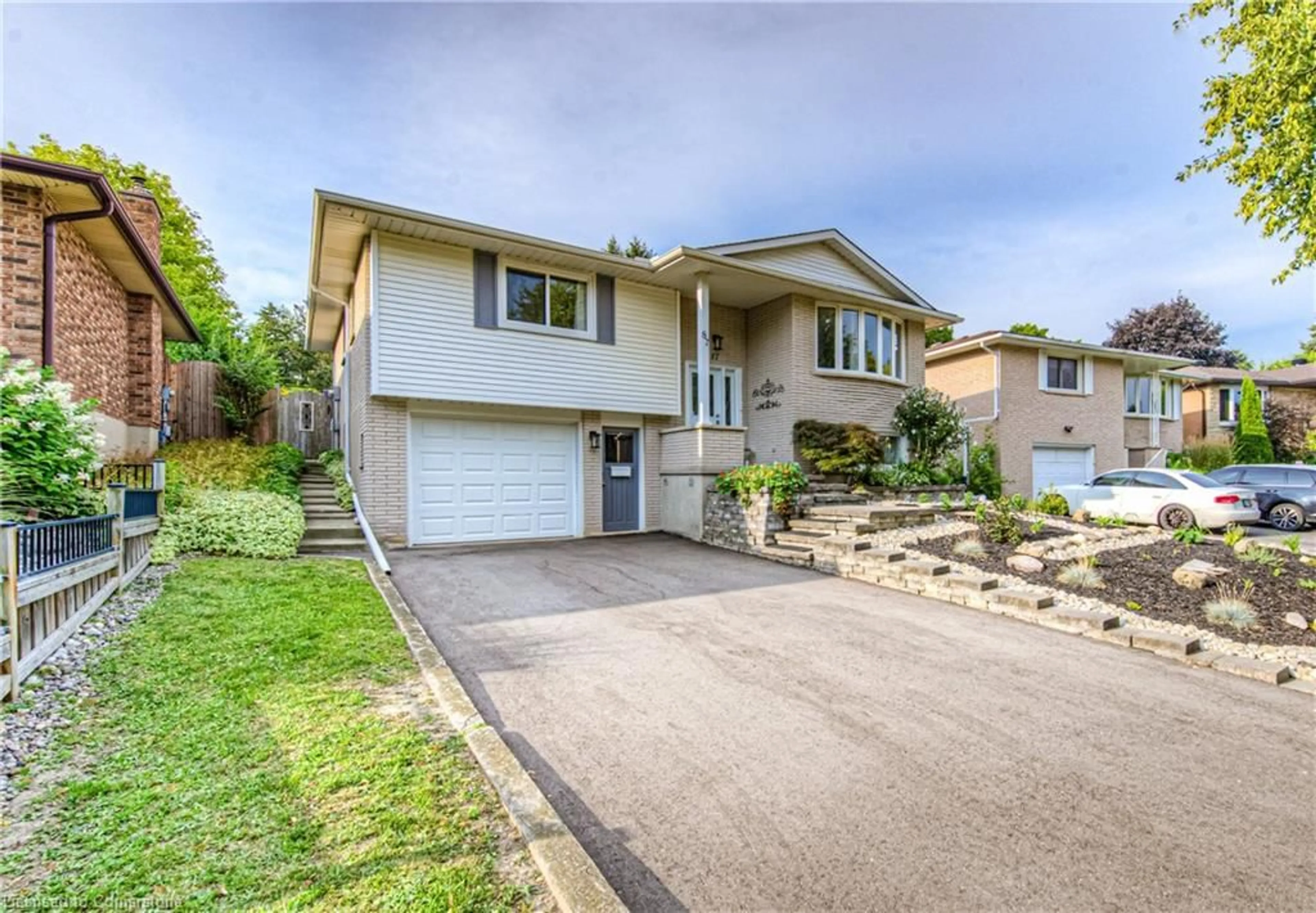 A pic from outside/outdoor area/front of a property/back of a property/a pic from drone, street for 87 Radcliffe Dr, Kitchener Ontario N2E 1Y7