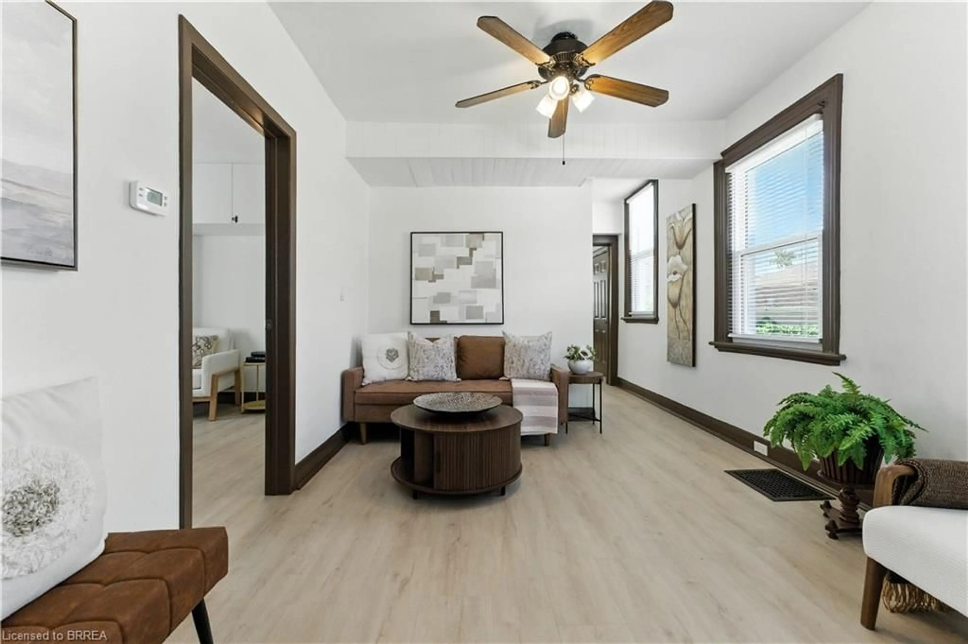 Living room with furniture, wood/laminate floor for 39 Allenby Ave, Brantford Ontario N3S 1R1