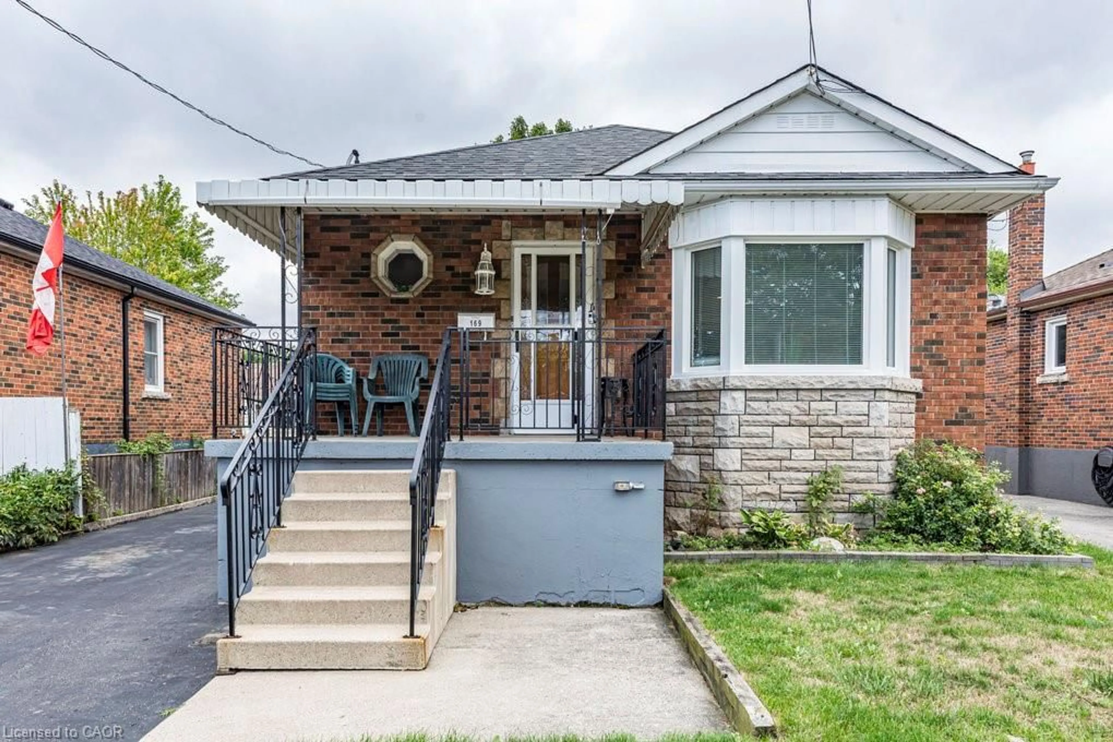 Home with brick exterior material, street for 169 East 32nd St, Hamilton Ontario L8V 3S1