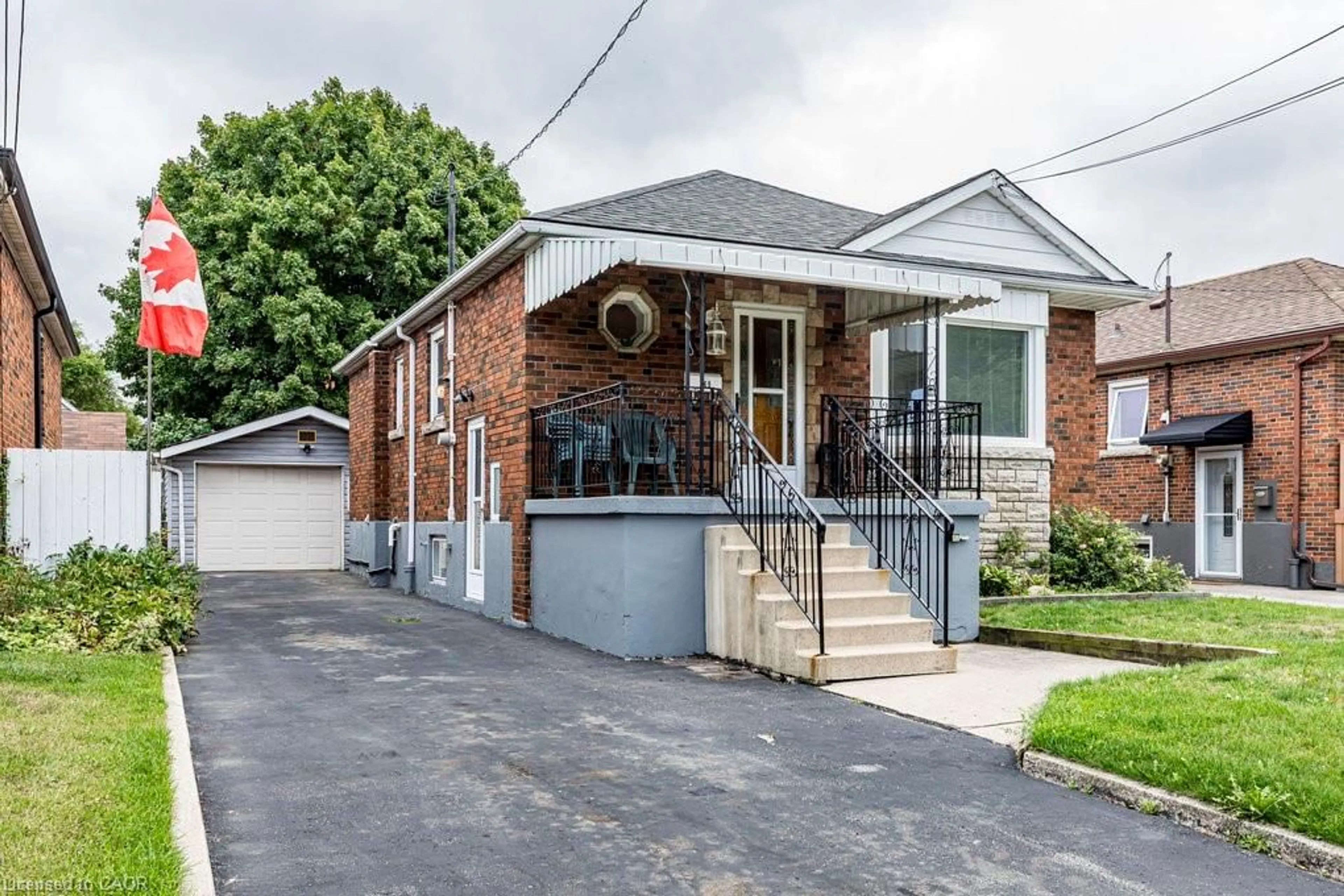 Home with brick exterior material, street for 169 East 32nd St, Hamilton Ontario L8V 3S1