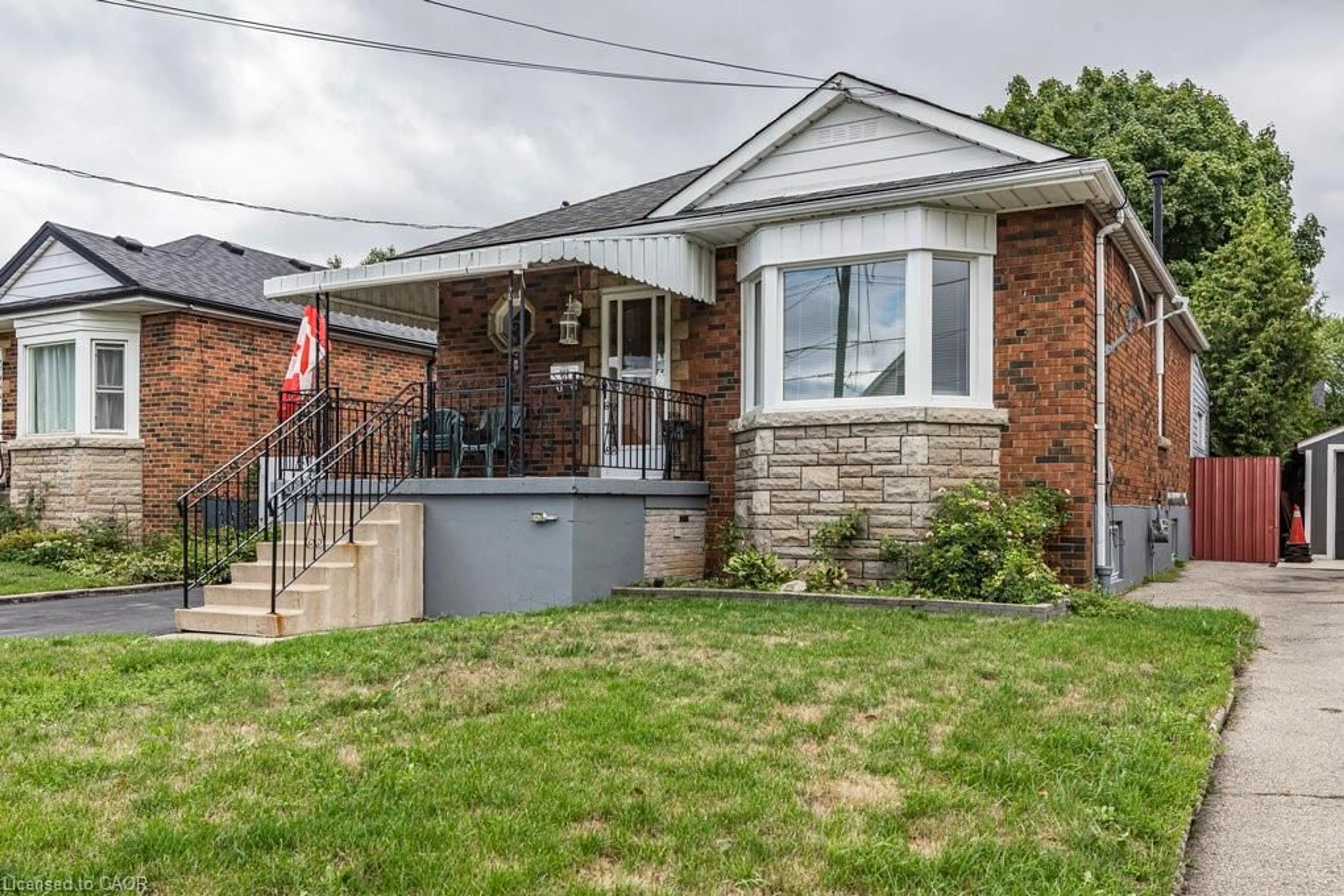 Home with brick exterior material, street for 169 East 32nd St, Hamilton Ontario L8V 3S1