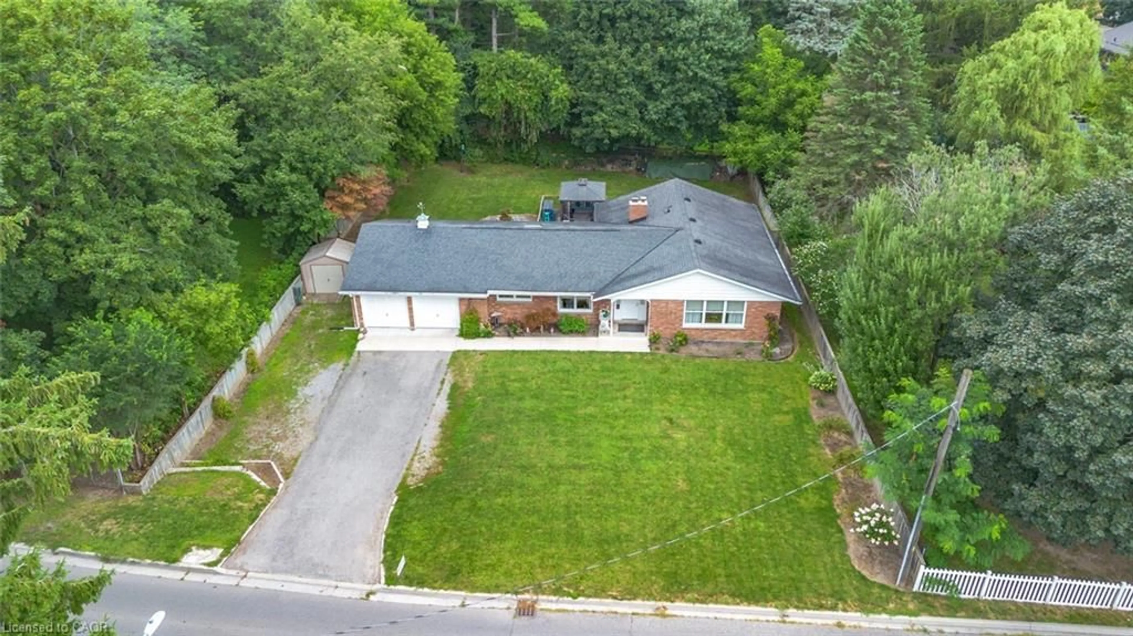 A pic from outside/outdoor area/front of a property/back of a property/a pic from drone, street for 15 Evergreen Hill Rd, Simcoe Ontario N3Y 1B7