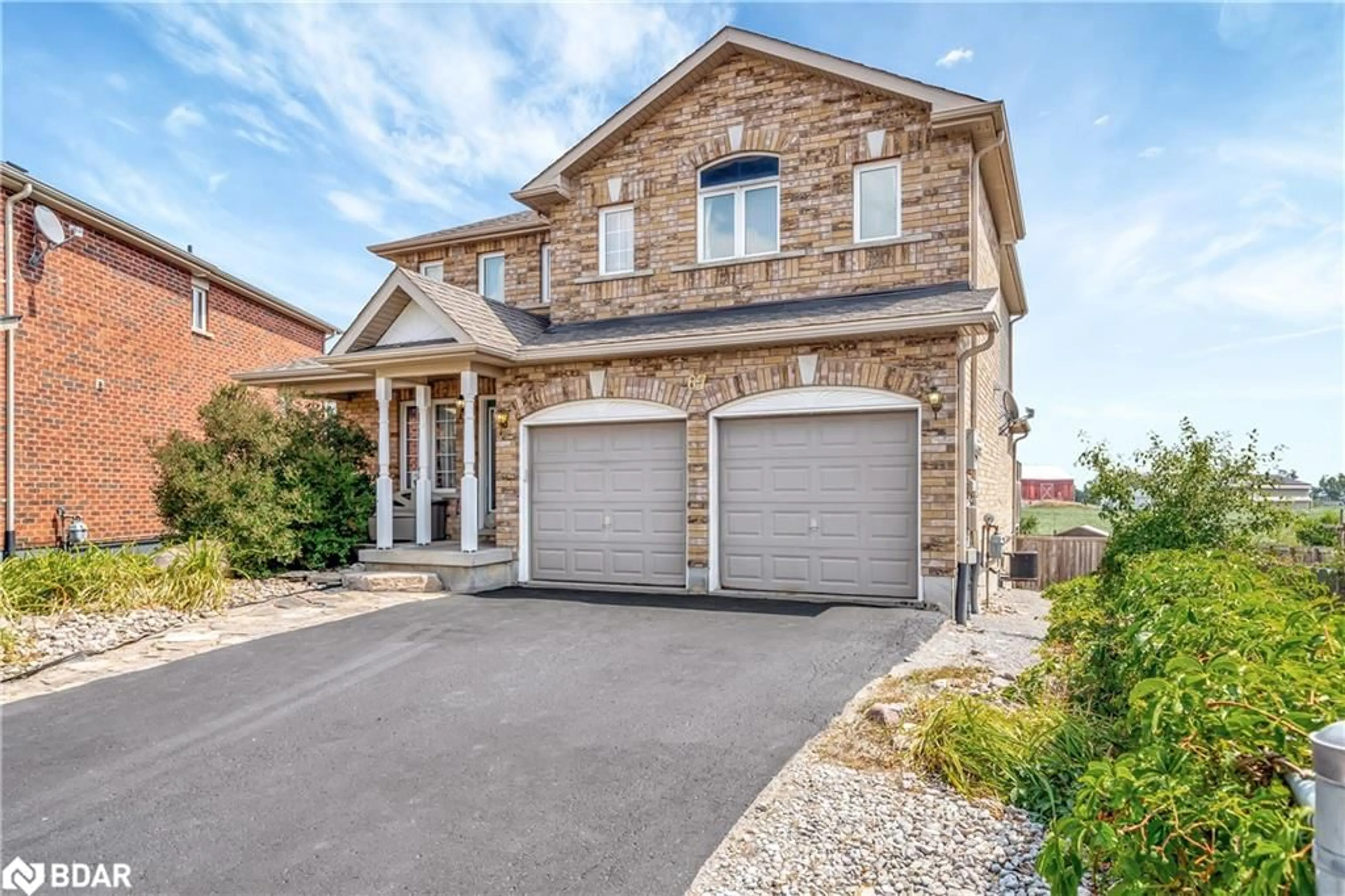 Home with brick exterior material, street for 67 Sweetnam Dr, Lindsay Ontario K9V 0A7