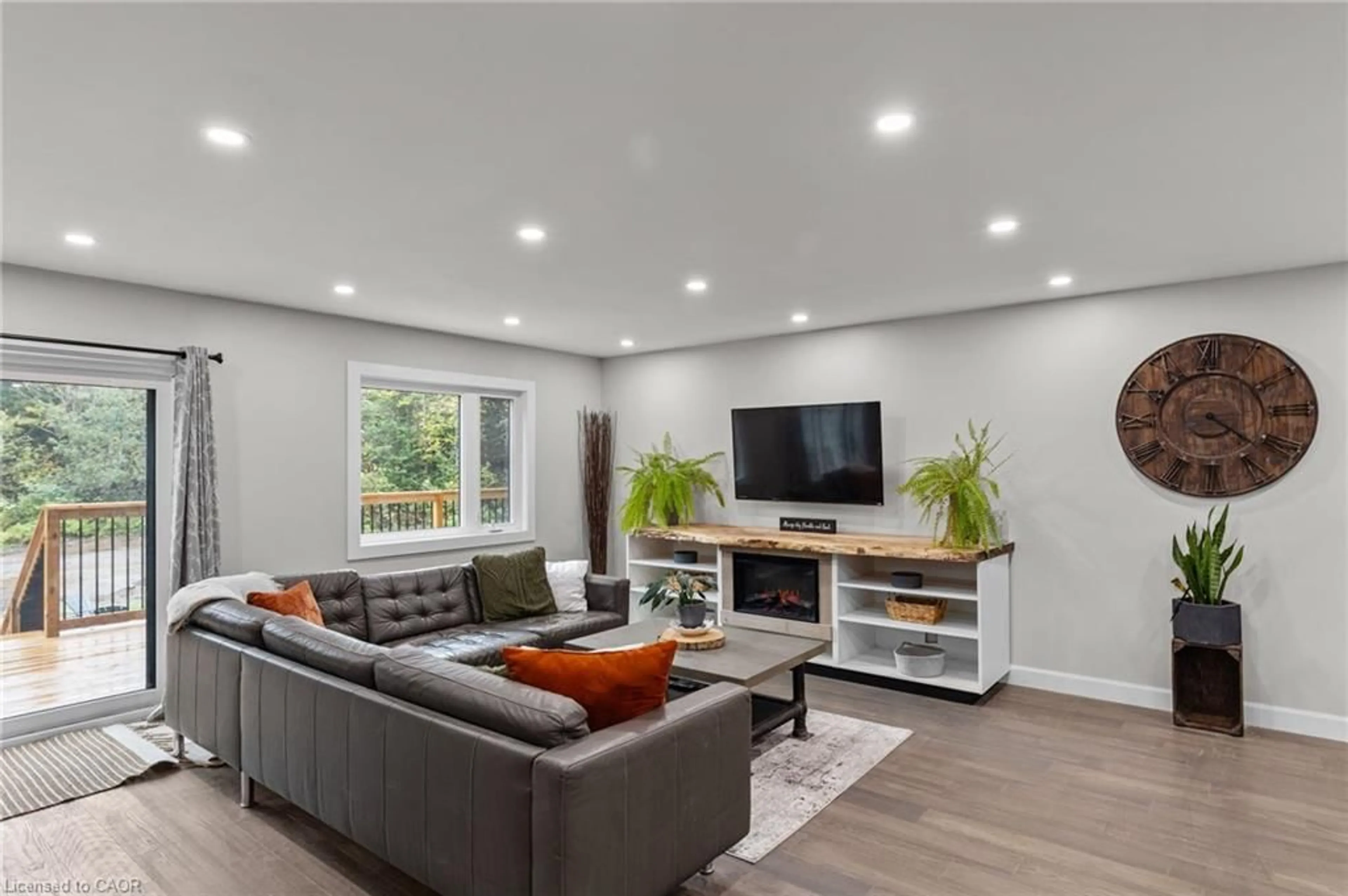 Living room with furniture, wood/laminate floor for 127 Paradise Road, Nipissing Ontario K0J 2M0
