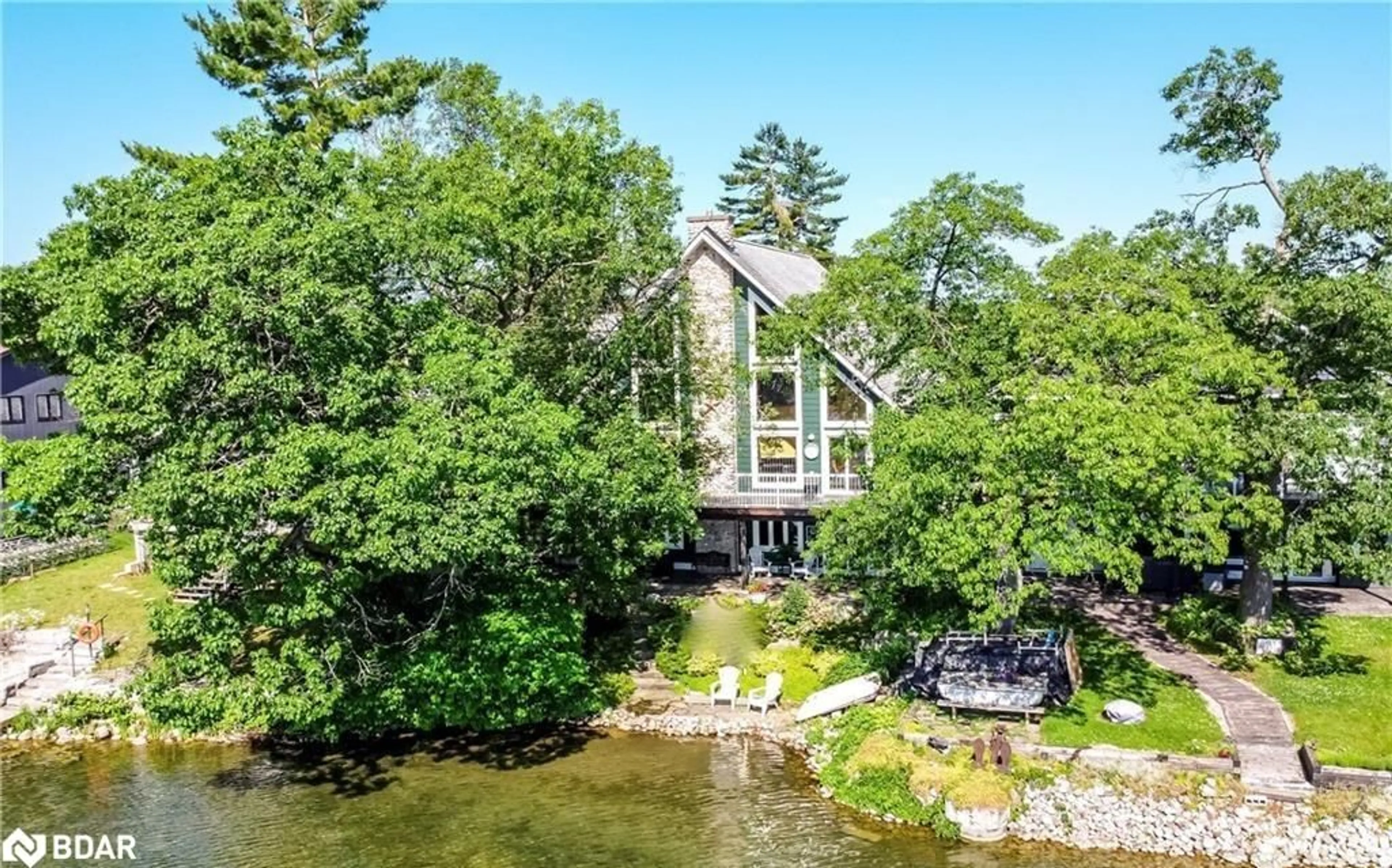 A pic from outside/outdoor area/front of a property/back of a property/a pic from drone, water/lake/river/ocean view for 3931 Menoke Beach Rd, Severn Ontario L3V 0T9