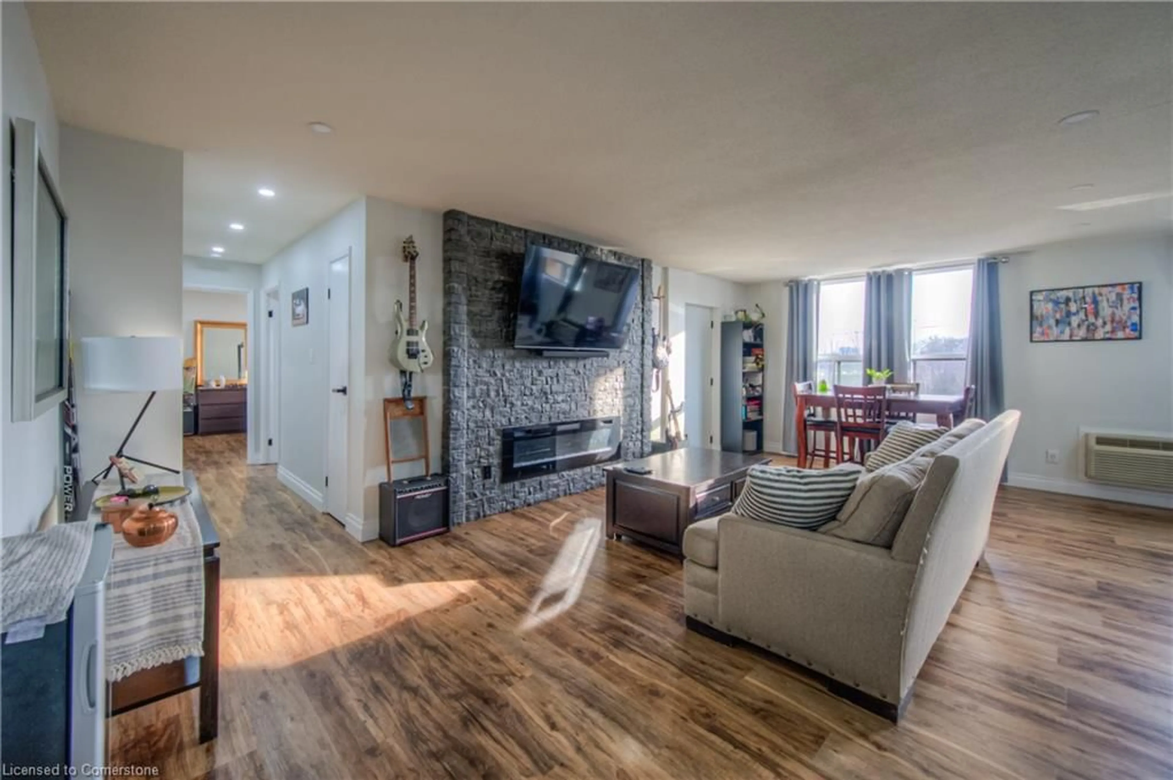 Living room with furniture, unknown for 185 Kehl St #410, Kitchener Ontario N2M 5B9