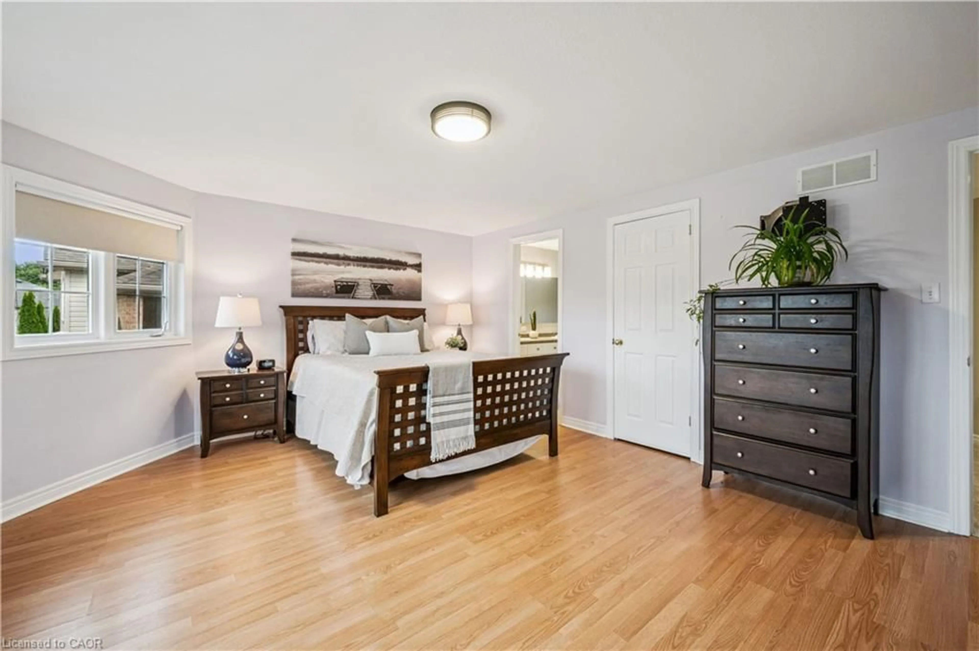 Bedroom with bed, wood/laminate floor for 533 Rush Meadow Cres, Kitchener Ontario N2R 1T2