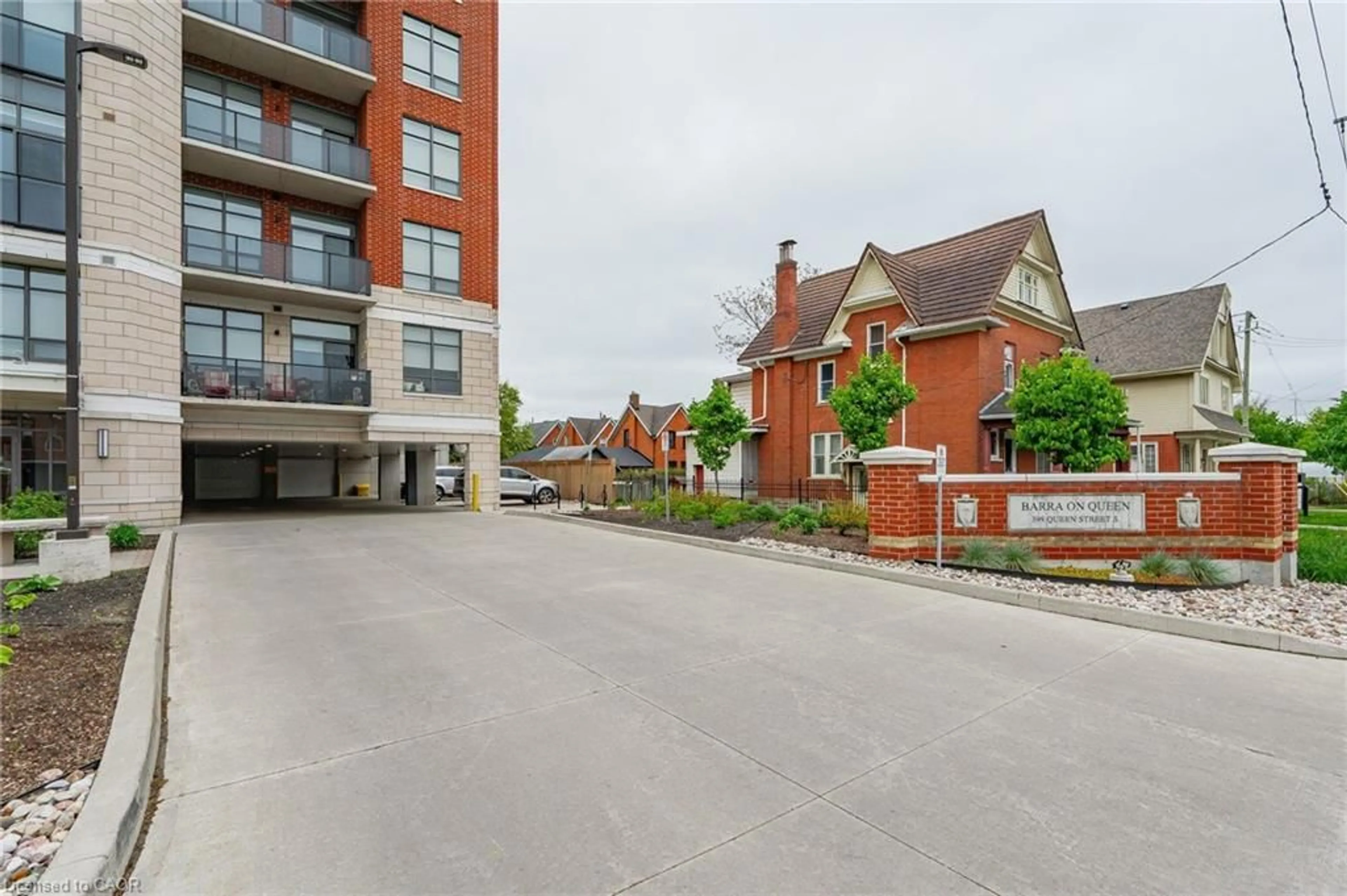 A pic from outside/outdoor area/front of a property/back of a property/a pic from drone, street for 399 Queen St #202, Kitchener Ontario N2G 0C4