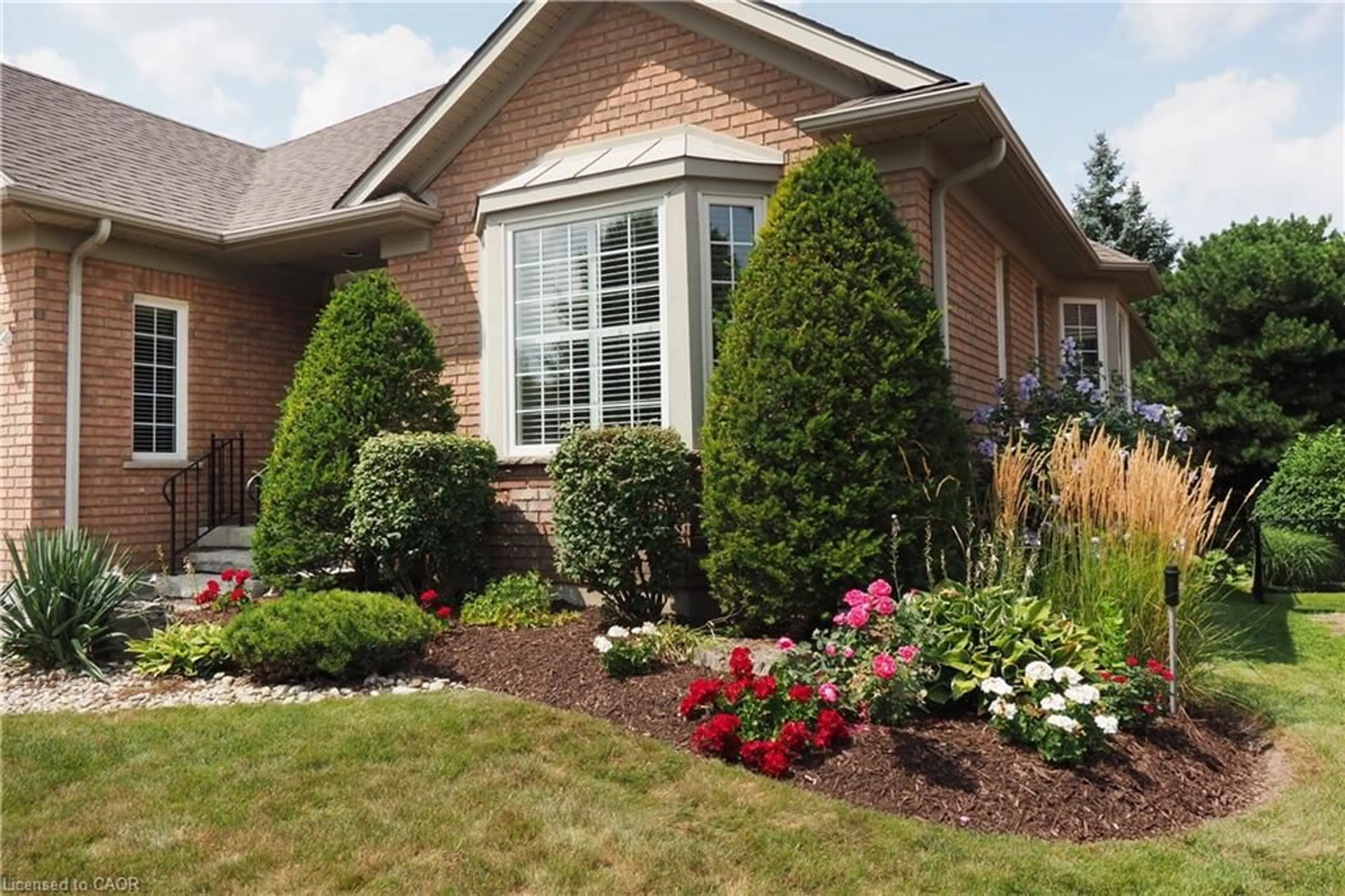 Home with brick exterior material, street for 212 The Lions Gate, Waterloo Ontario N2L 6M5