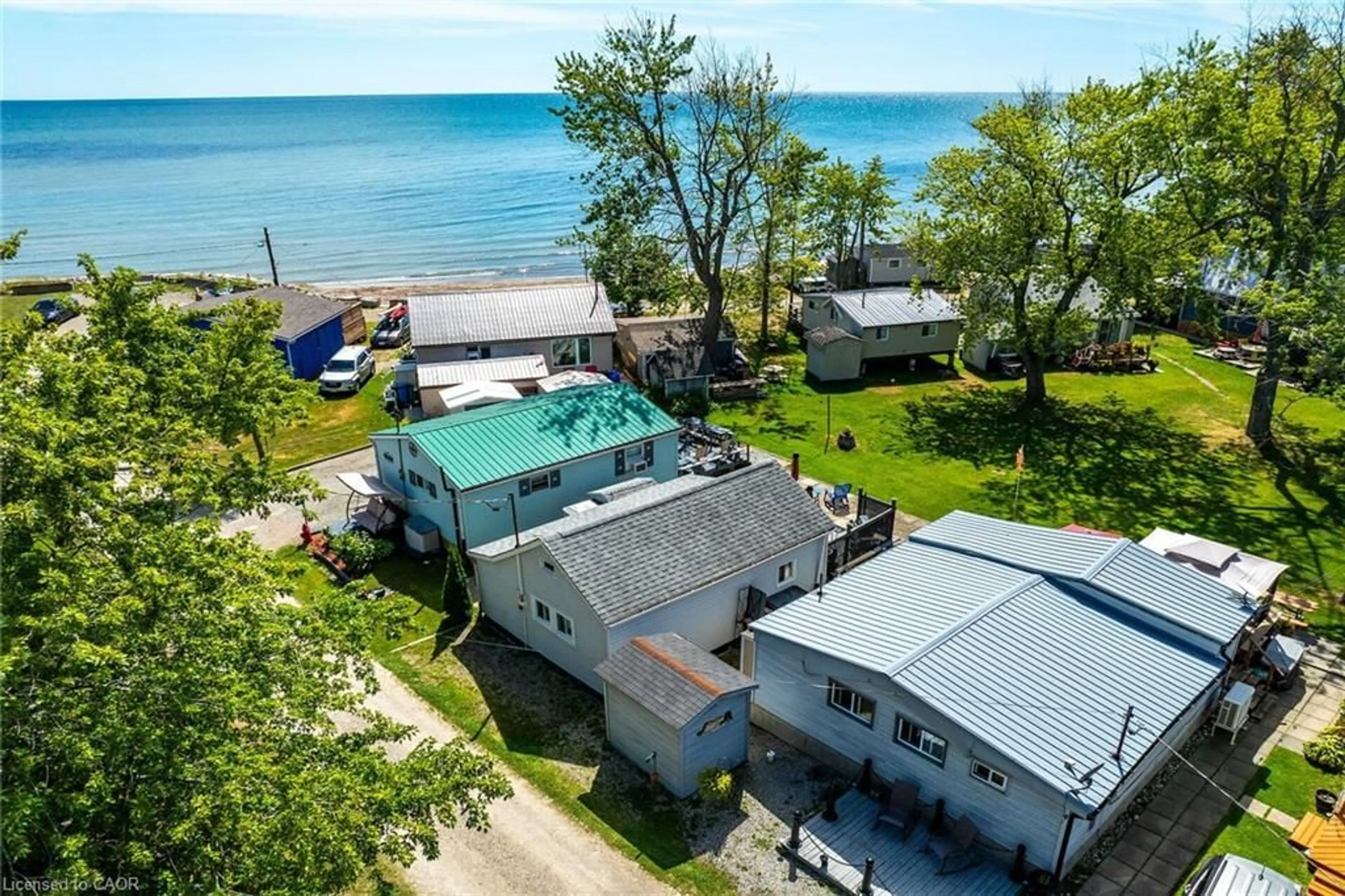 A pic from outside/outdoor area/front of a property/back of a property/a pic from drone, water/lake/river/ocean view for 6 Pike Lane, Featherstone Point Ontario N0A 1P0