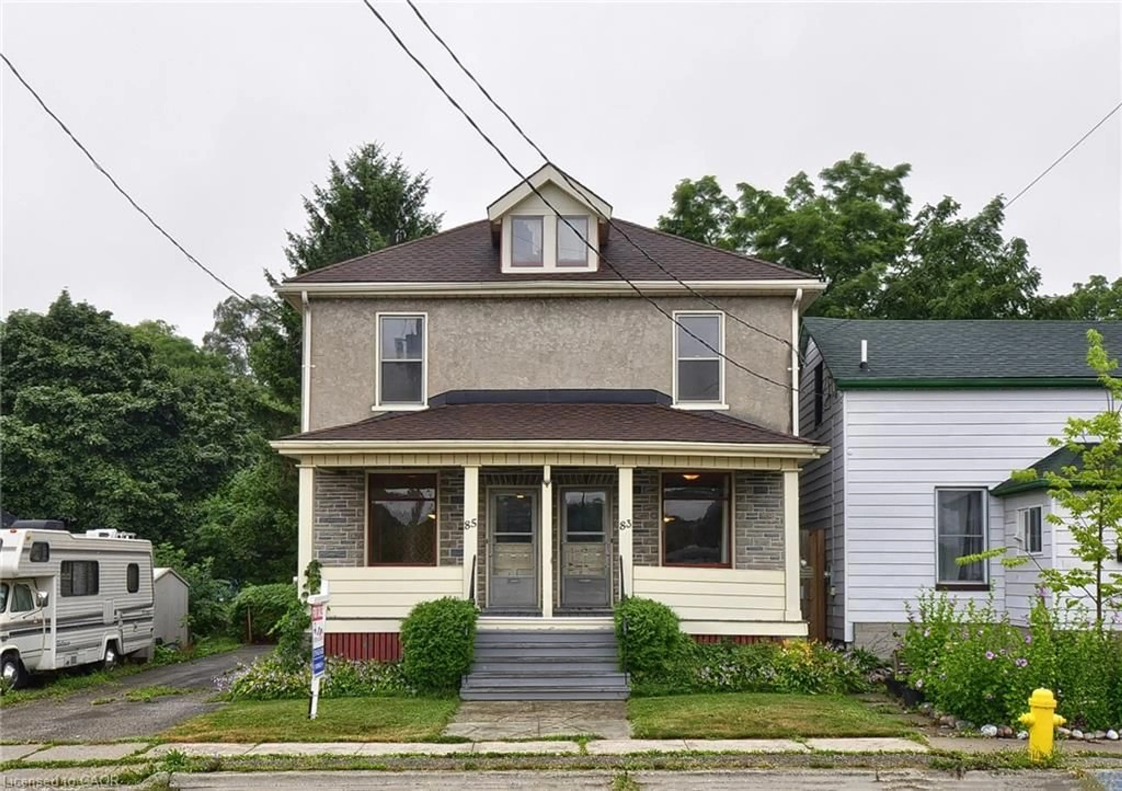 Home with vinyl exterior material, street for 83 Shade St, Cambridge Ontario N1R 4J7