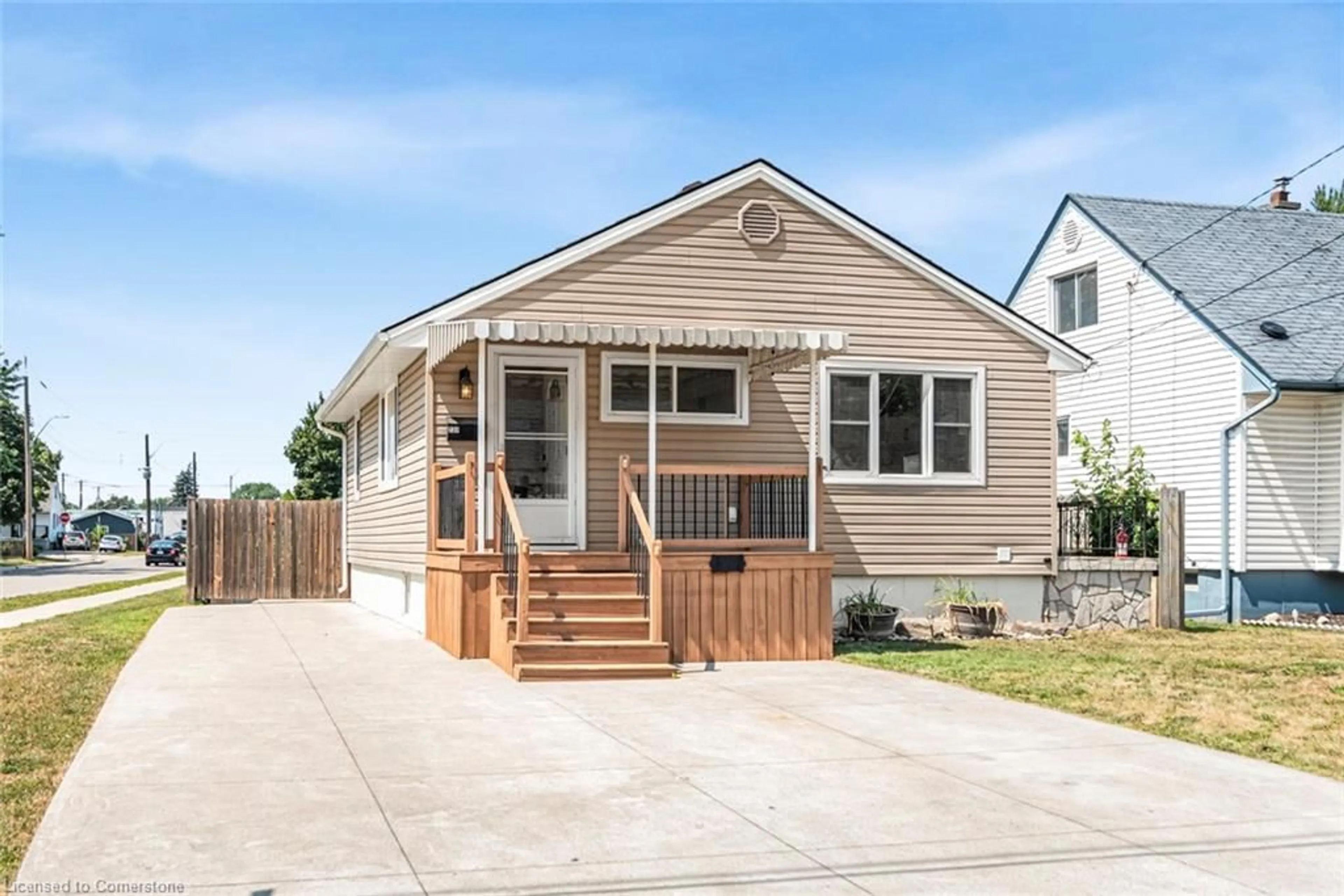 Home with vinyl exterior material, street for 237 Adair Ave, Hamilton Ontario L8H 6B3