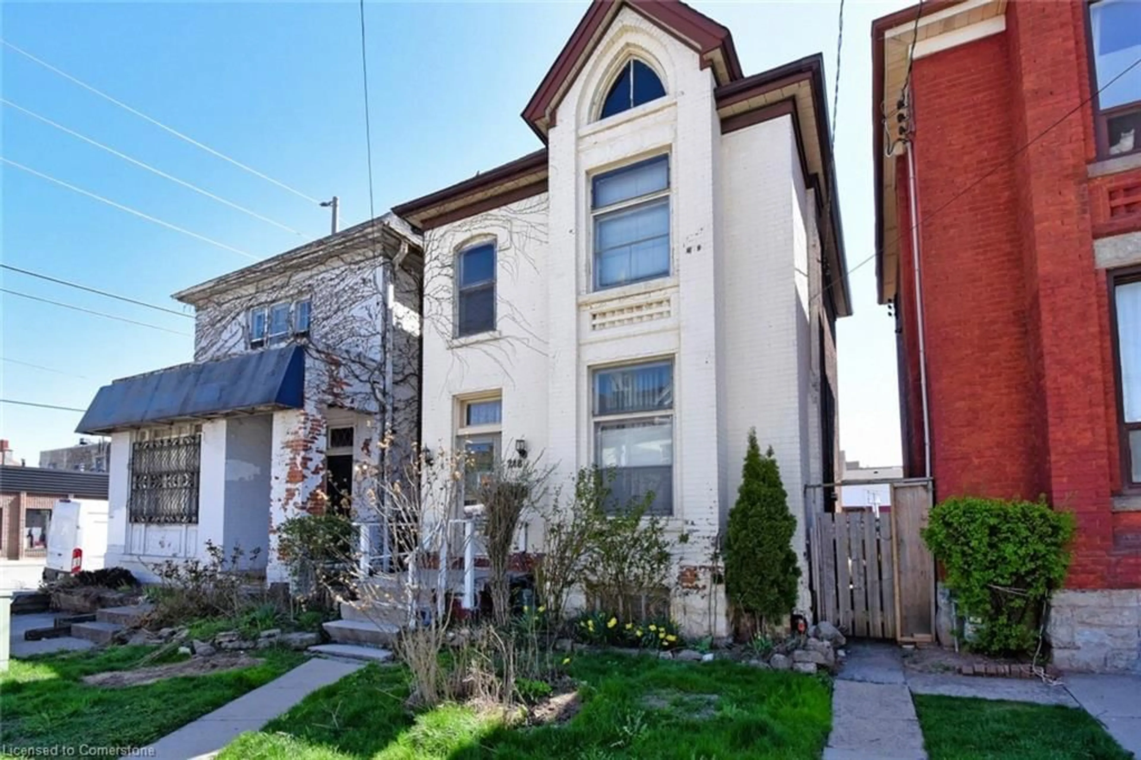 Home with brick exterior material, street for 248 Hughson St, Hamilton Ontario L8L 4M3