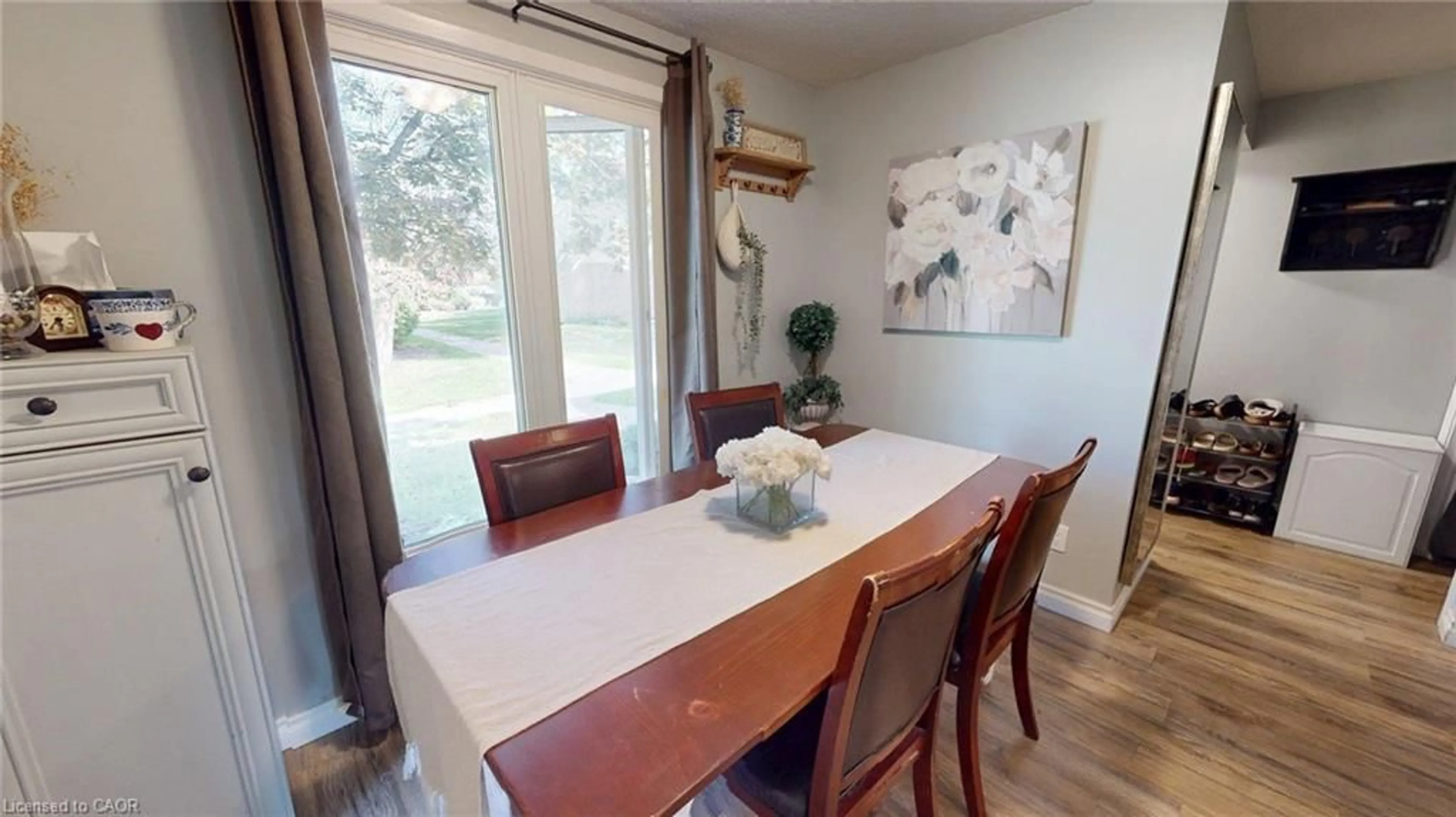 Dining room, wood/laminate floor for 91 Avonwood Dr #17, Stratford Ontario N4Z 1B2