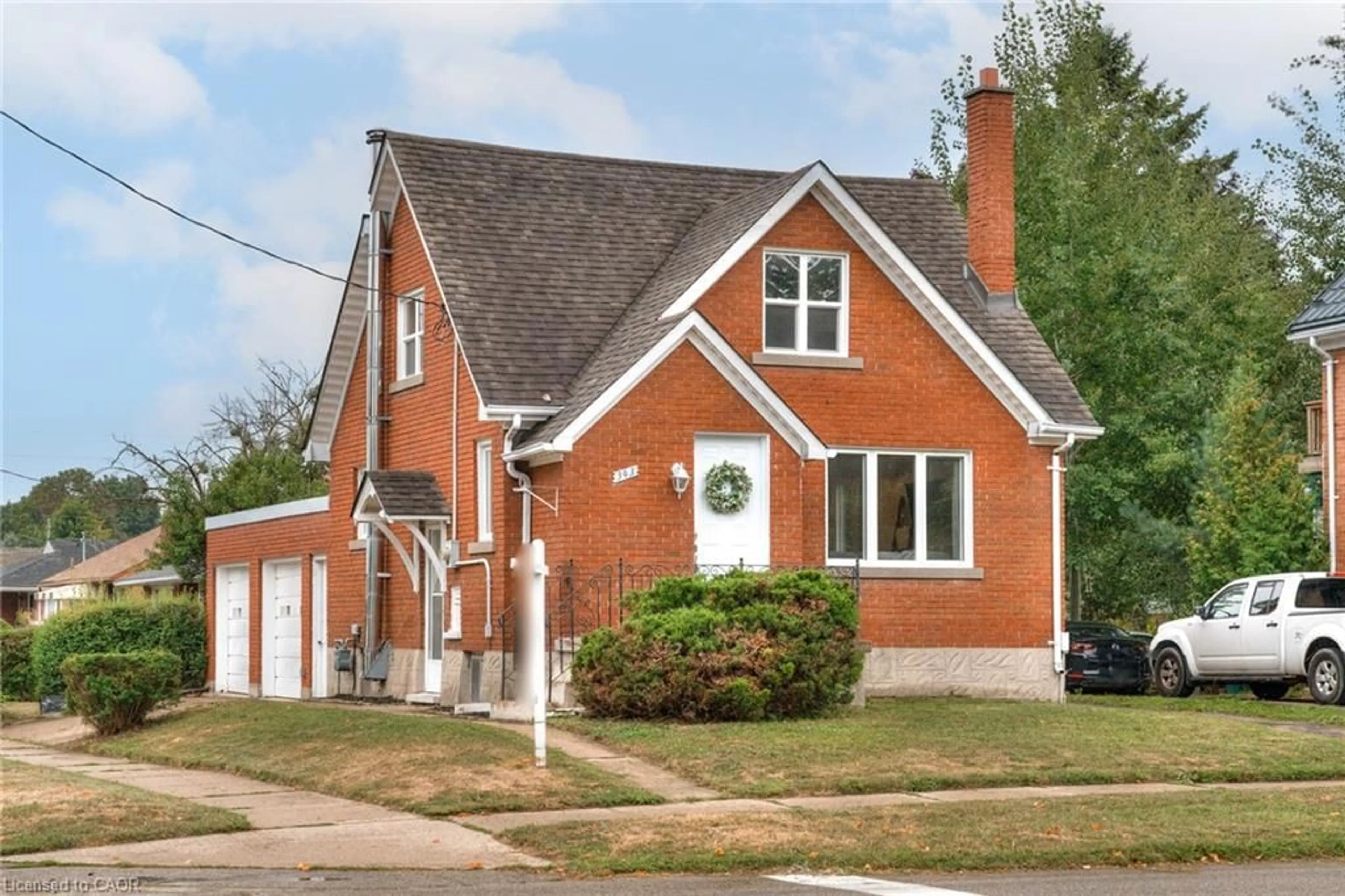 Home with brick exterior material, street for 343 Greenfield Ave, Kitchener Ontario N2C 1E2