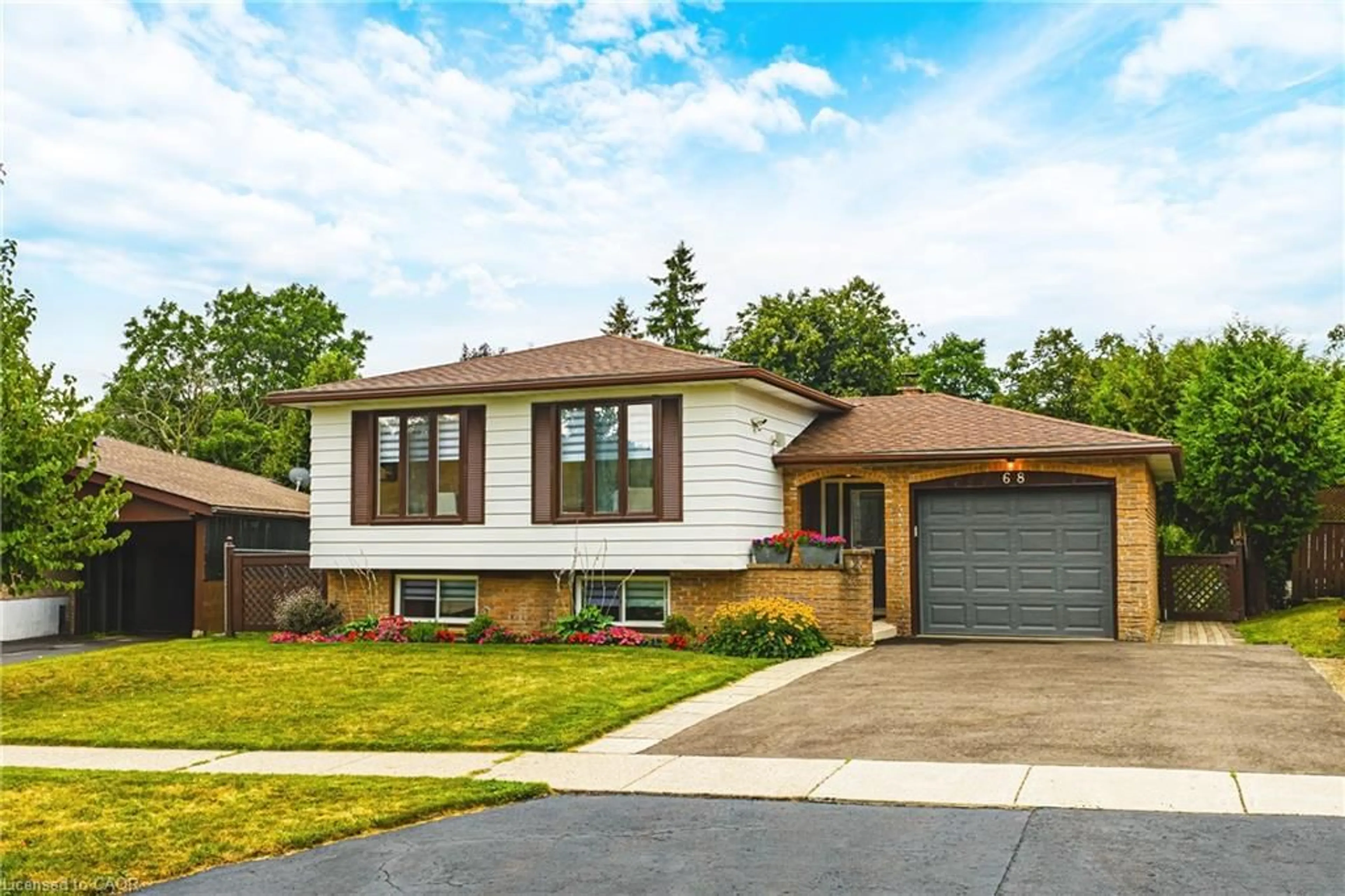 Home with brick exterior material, street for 68 Scott Rd, Cambridge Ontario N3C 2X4