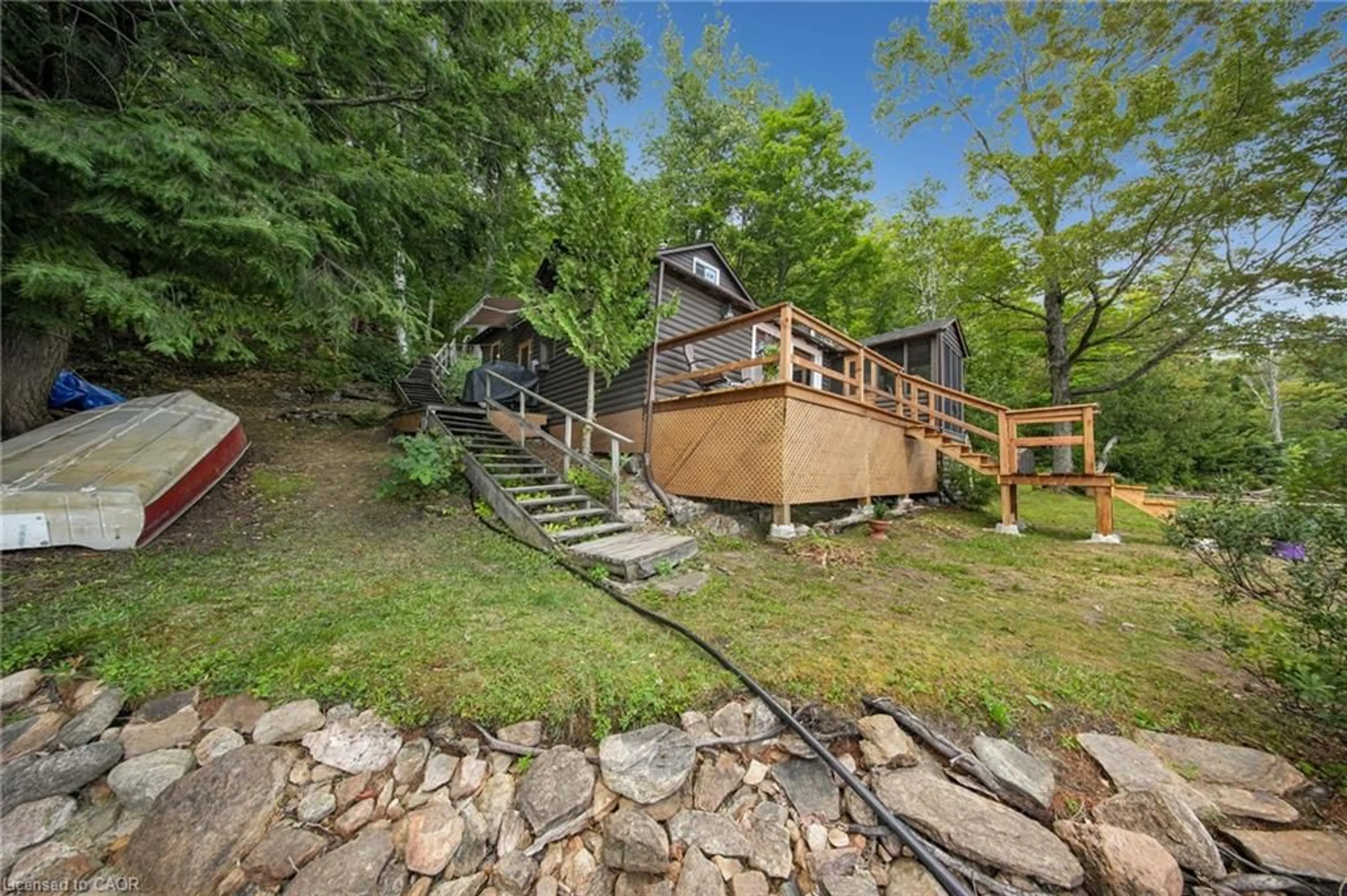 A pic from outside/outdoor area/front of a property/back of a property/a pic from drone, water/lake/river/ocean view for 2724 Kushog Lake Rd, Haliburton Ontario K0M 1J2