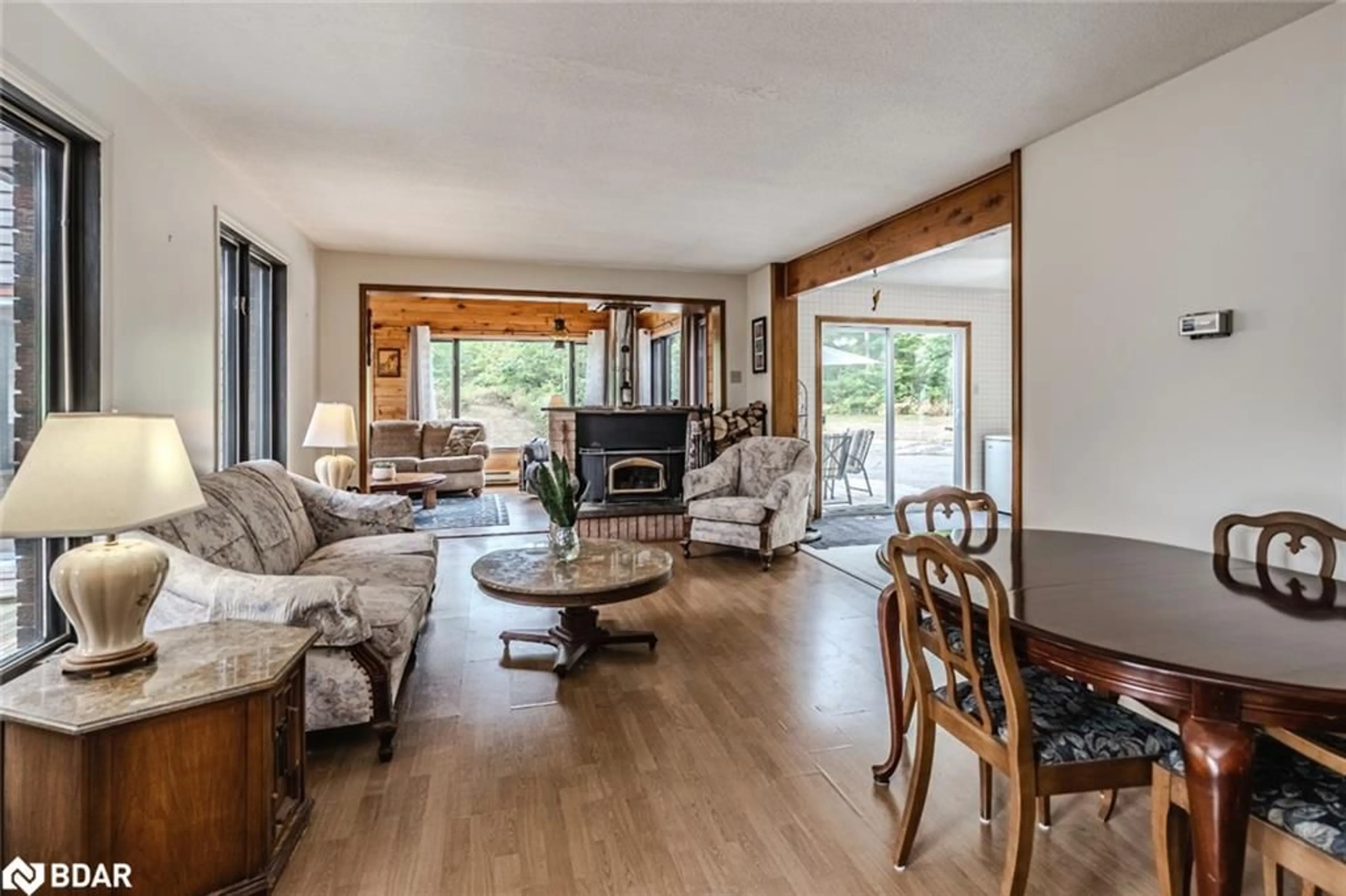 Living room with furniture, wood/laminate floor for 1506 Torpitt Road, Severn Ontario P0E 1N0