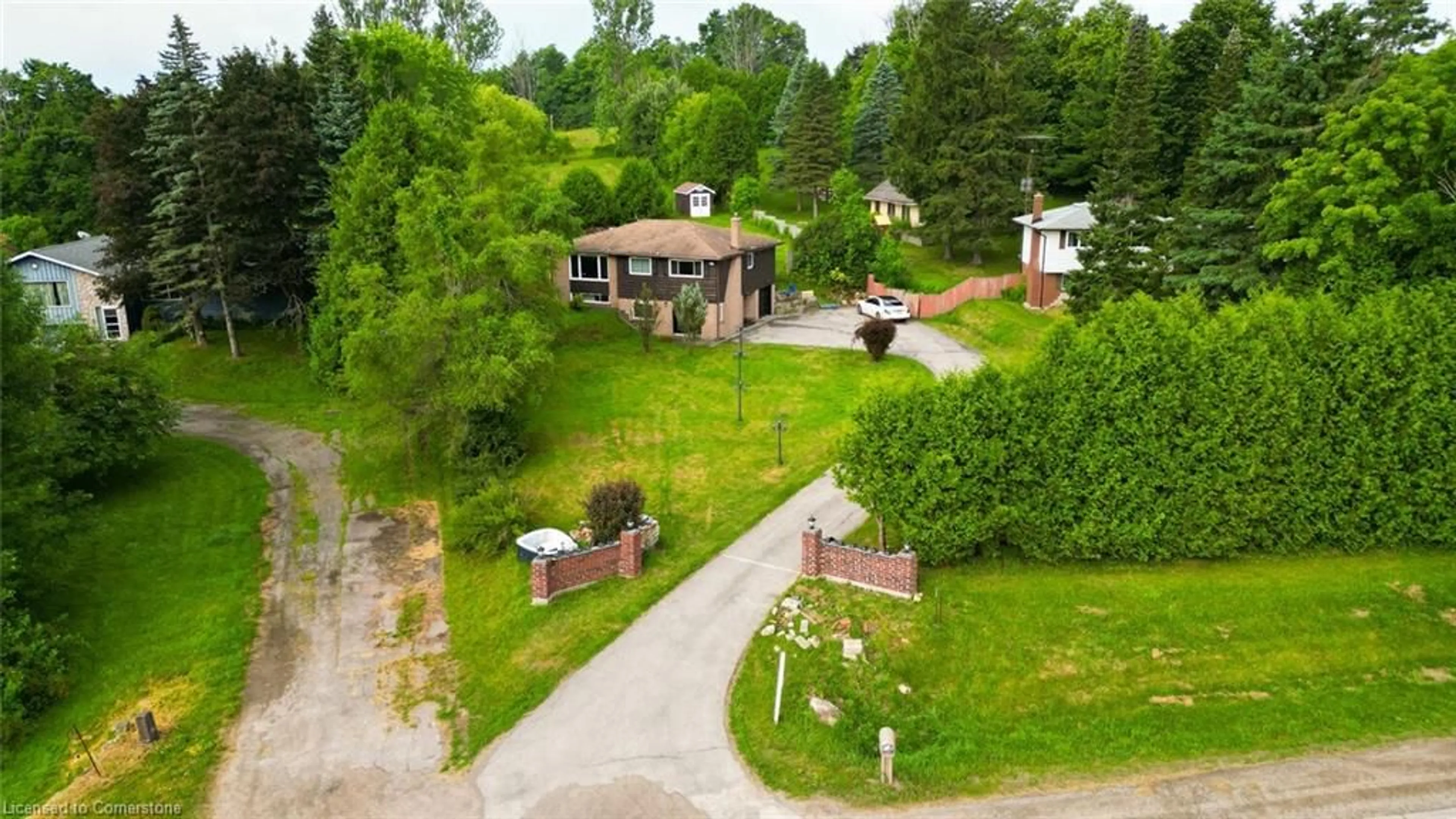 A pic from outside/outdoor area/front of a property/back of a property/a pic from drone, forest/trees view for 5172 Trafaglar Road Rd, Erin Ontario N0B 1T0