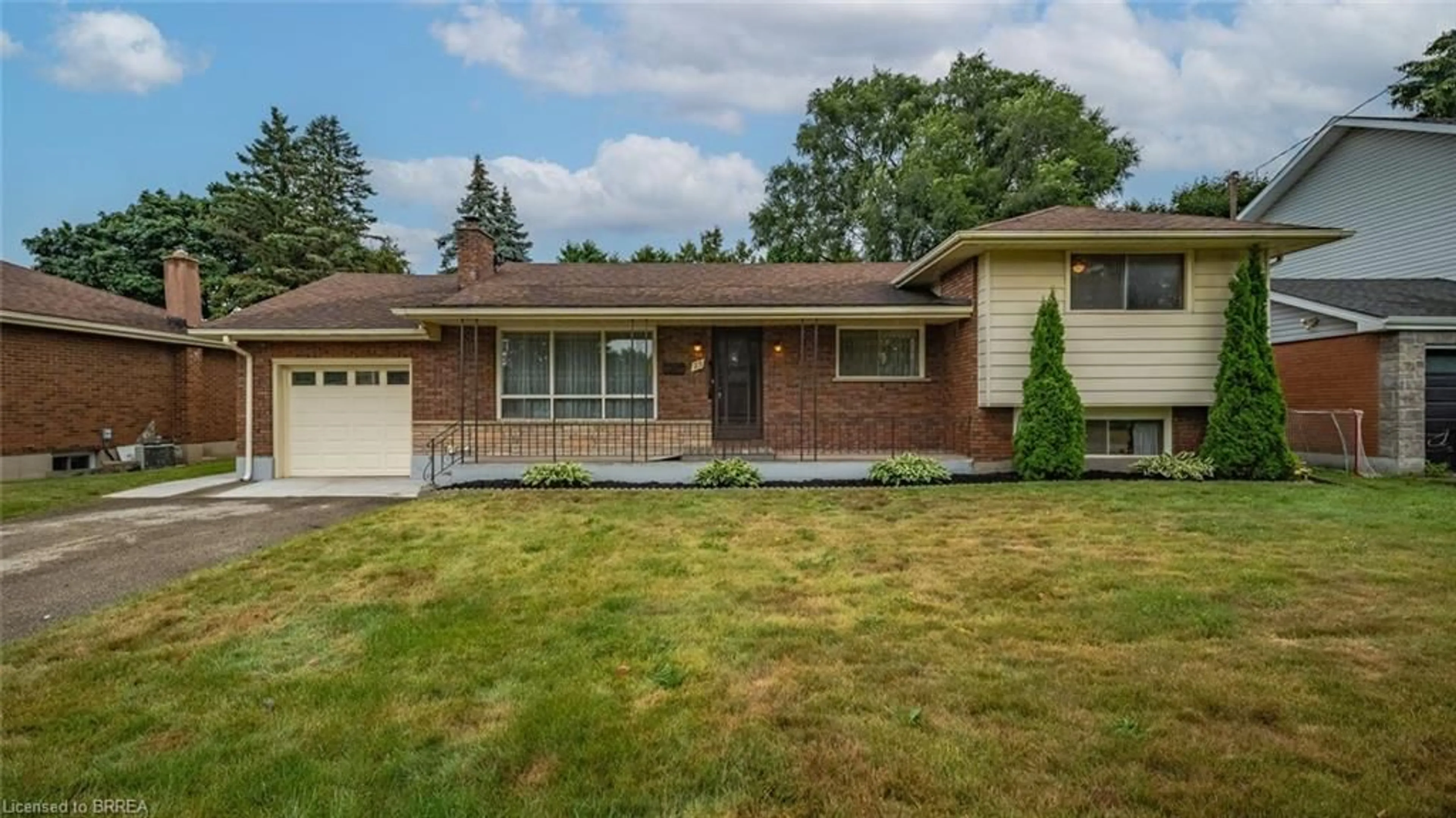 Home with brick exterior material, street for 25 Kensington Ave, Brantford Ontario N3R 3N6