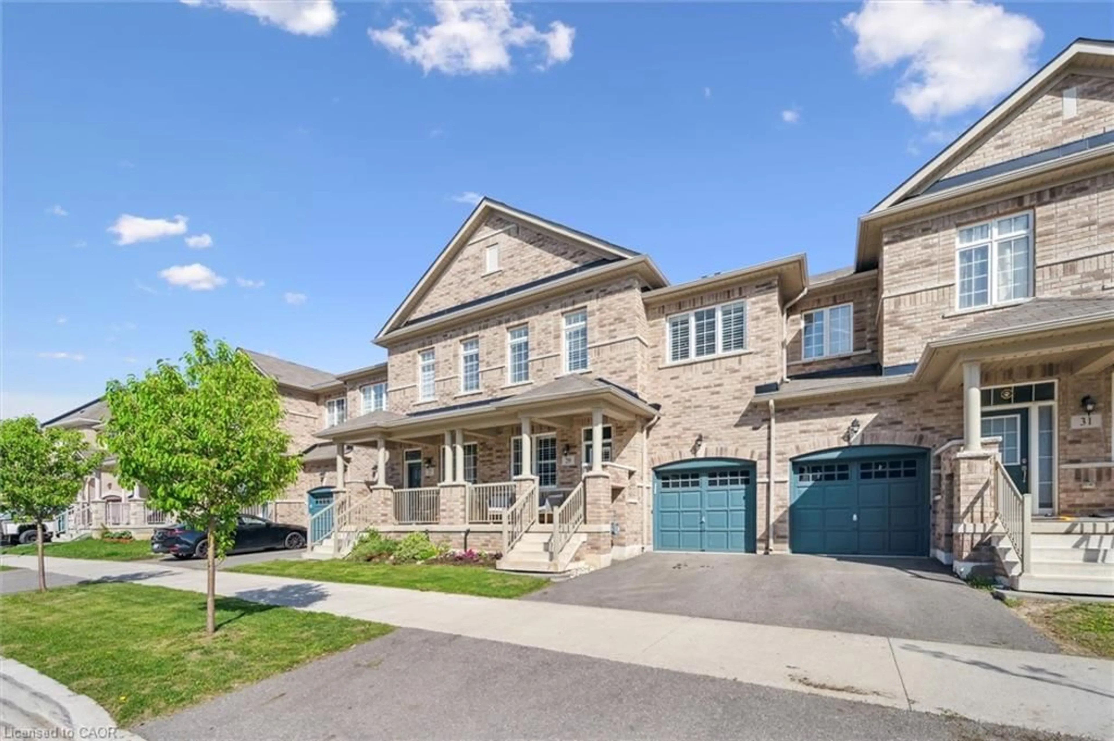 A pic from outside/outdoor area/front of a property/back of a property/a pic from drone, street for 29 Riverwalk Drive, Hamilton Ontario L8B 1X3