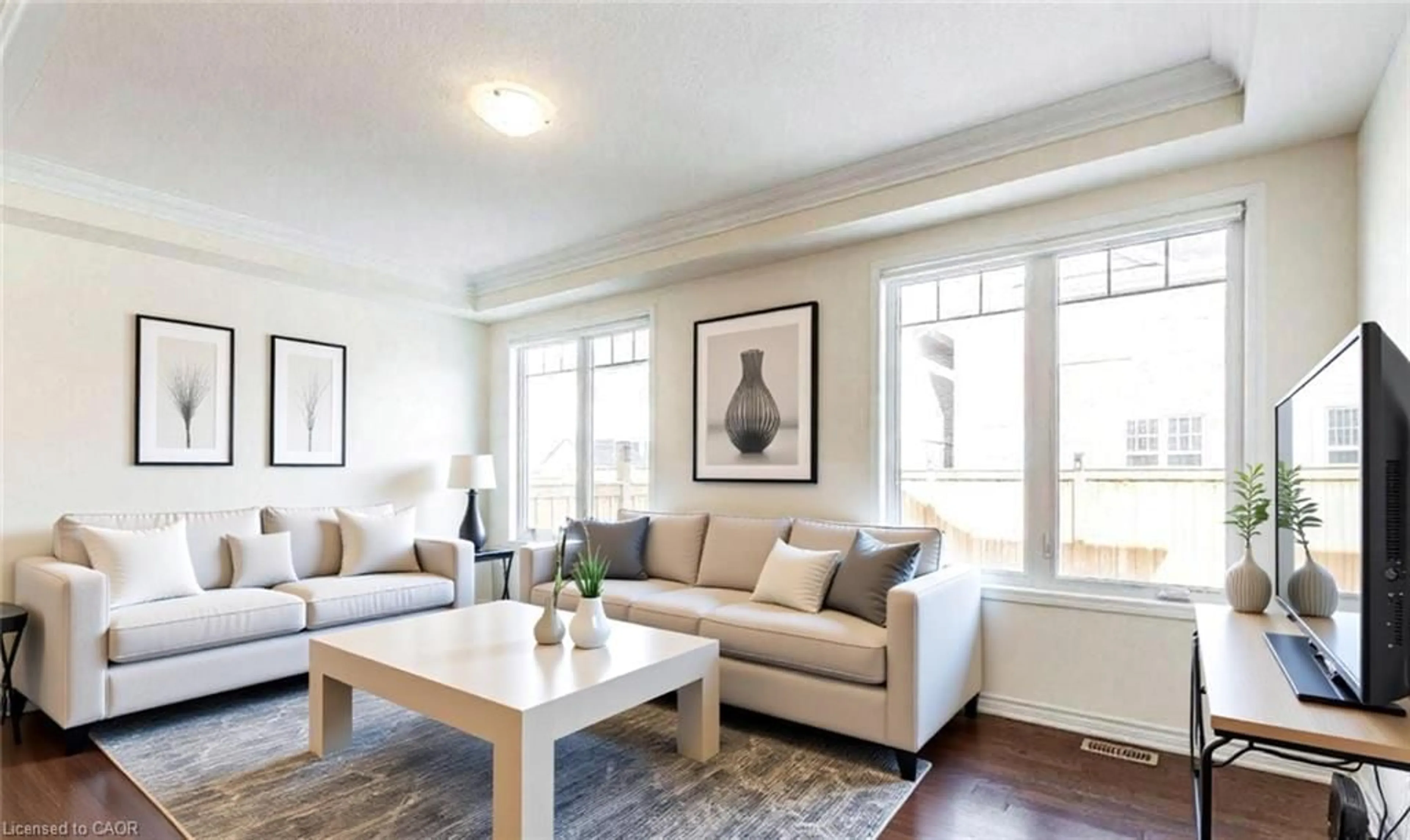 Living room with furniture, wood/laminate floor for 287 Grovehill Cres, Kitchener Ontario N2R 0K2