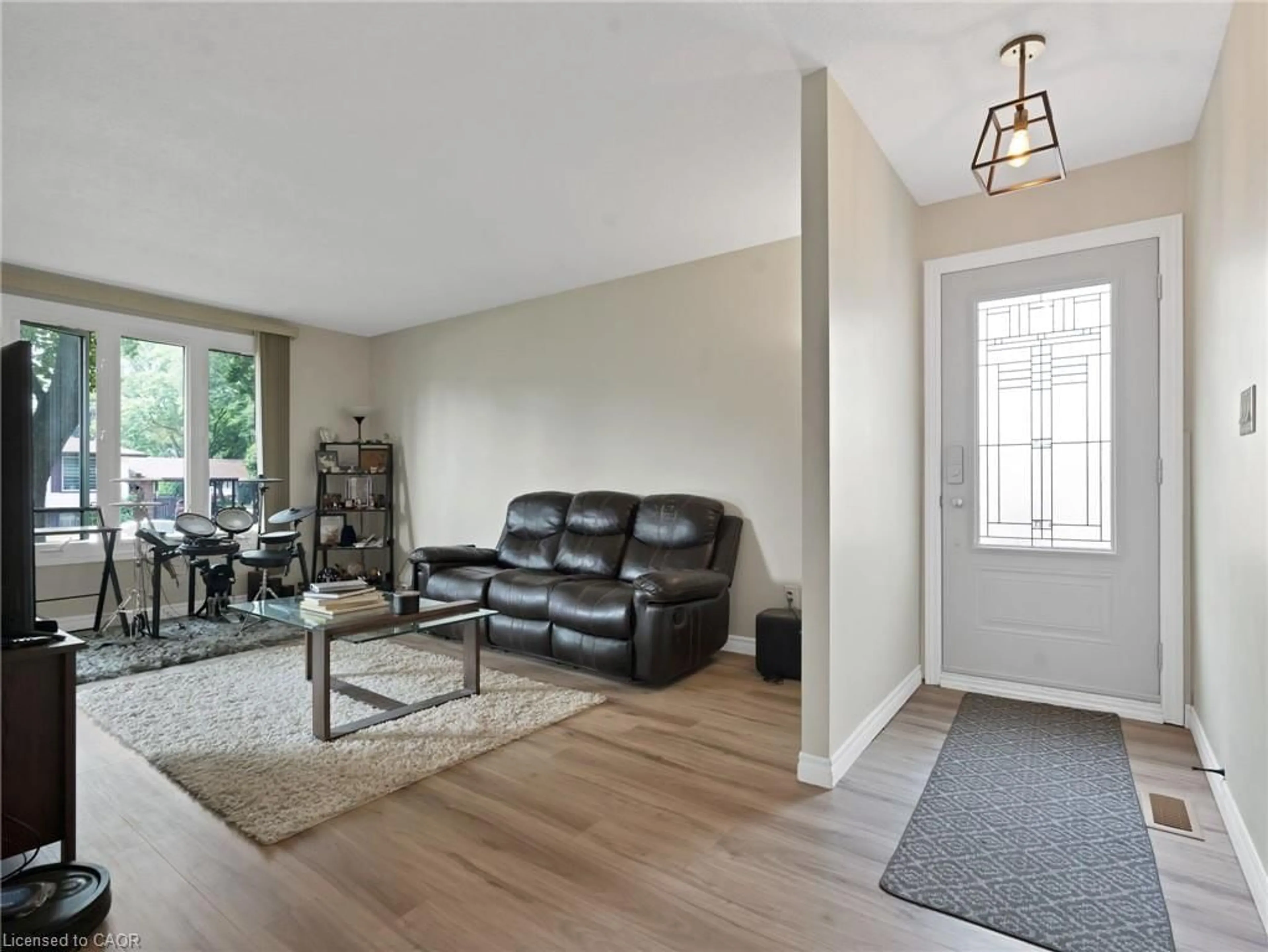 Living room with furniture, unknown for 64 Garrow Dr, Hamilton Ontario L9C 2X3