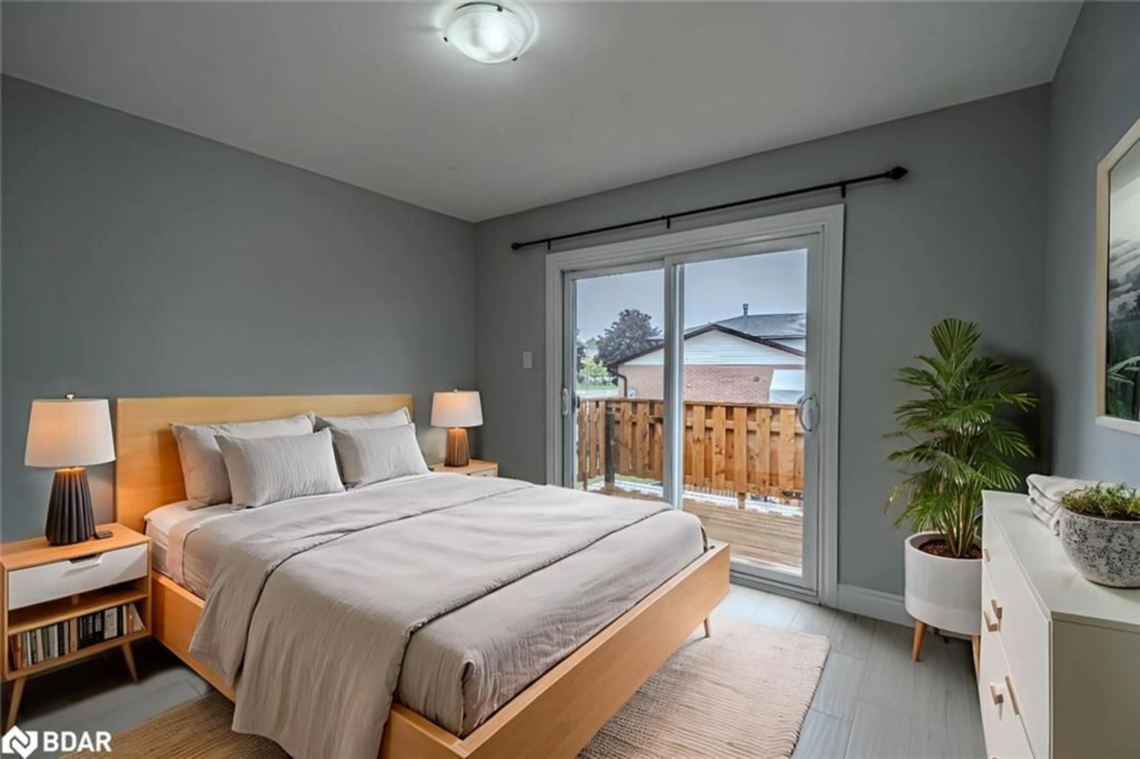 Bedroom with bed, wood/laminate floor for 388 Parkwood Ave, Bradford Ontario L3Z 2W9
