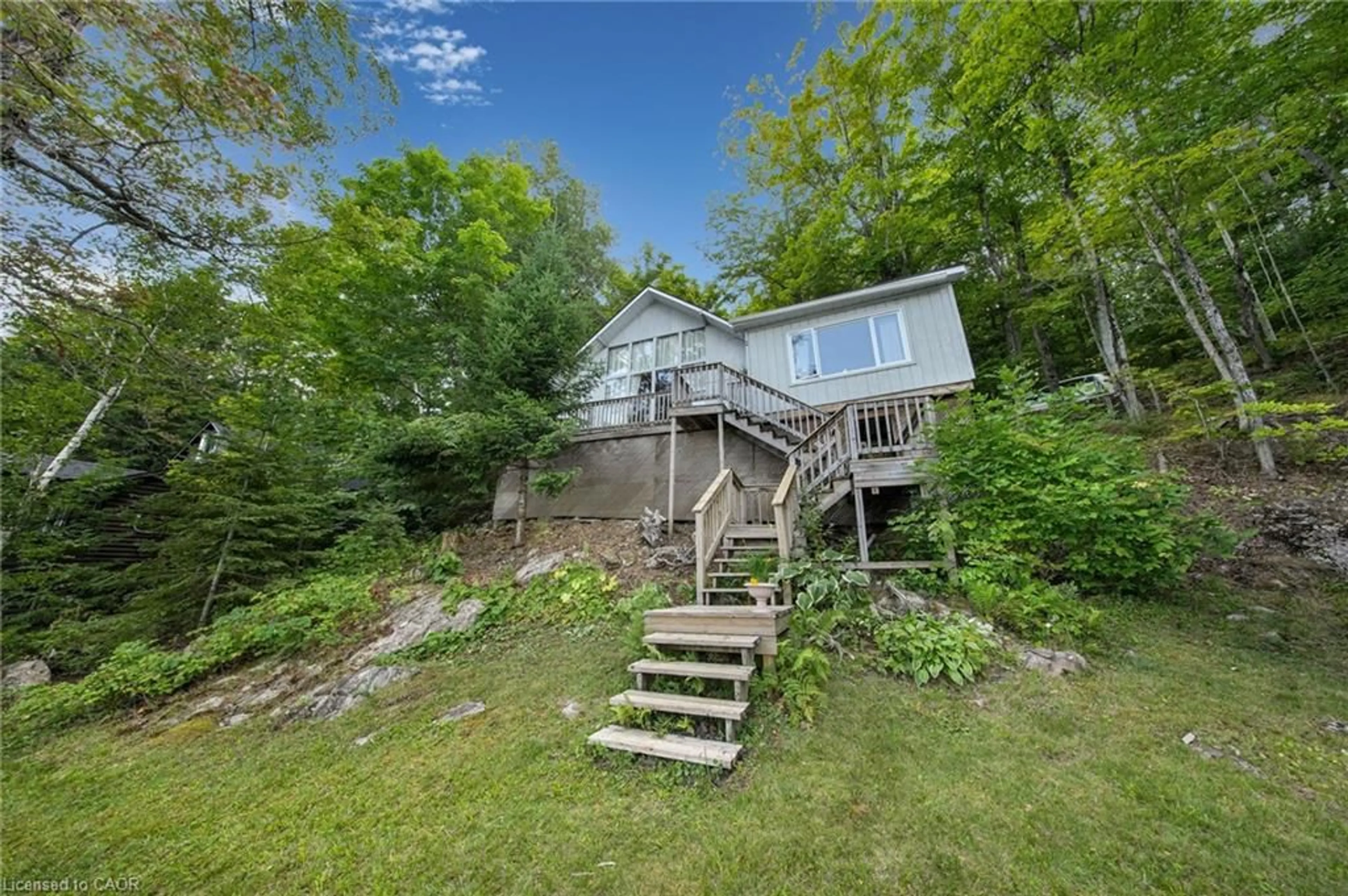 A pic from outside/outdoor area/front of a property/back of a property/a pic from drone, water/lake/river/ocean view for 2726 Kushog Lake Rd, Haliburton Ontario K0M 1J2