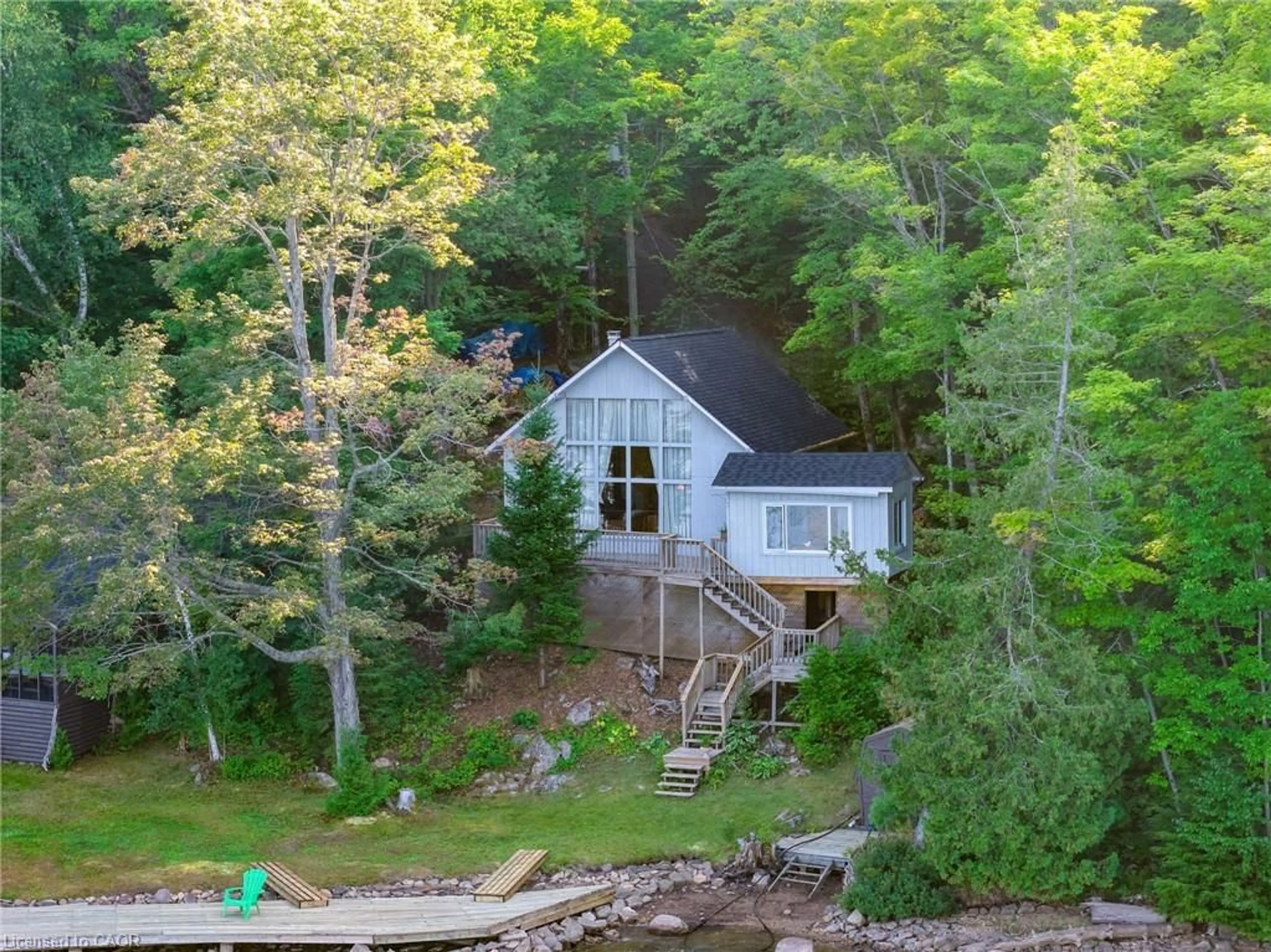 A pic from outside/outdoor area/front of a property/back of a property/a pic from drone, water/lake/river/ocean view for 2726 Kushog Lake Rd, Haliburton Ontario K0M 1J2