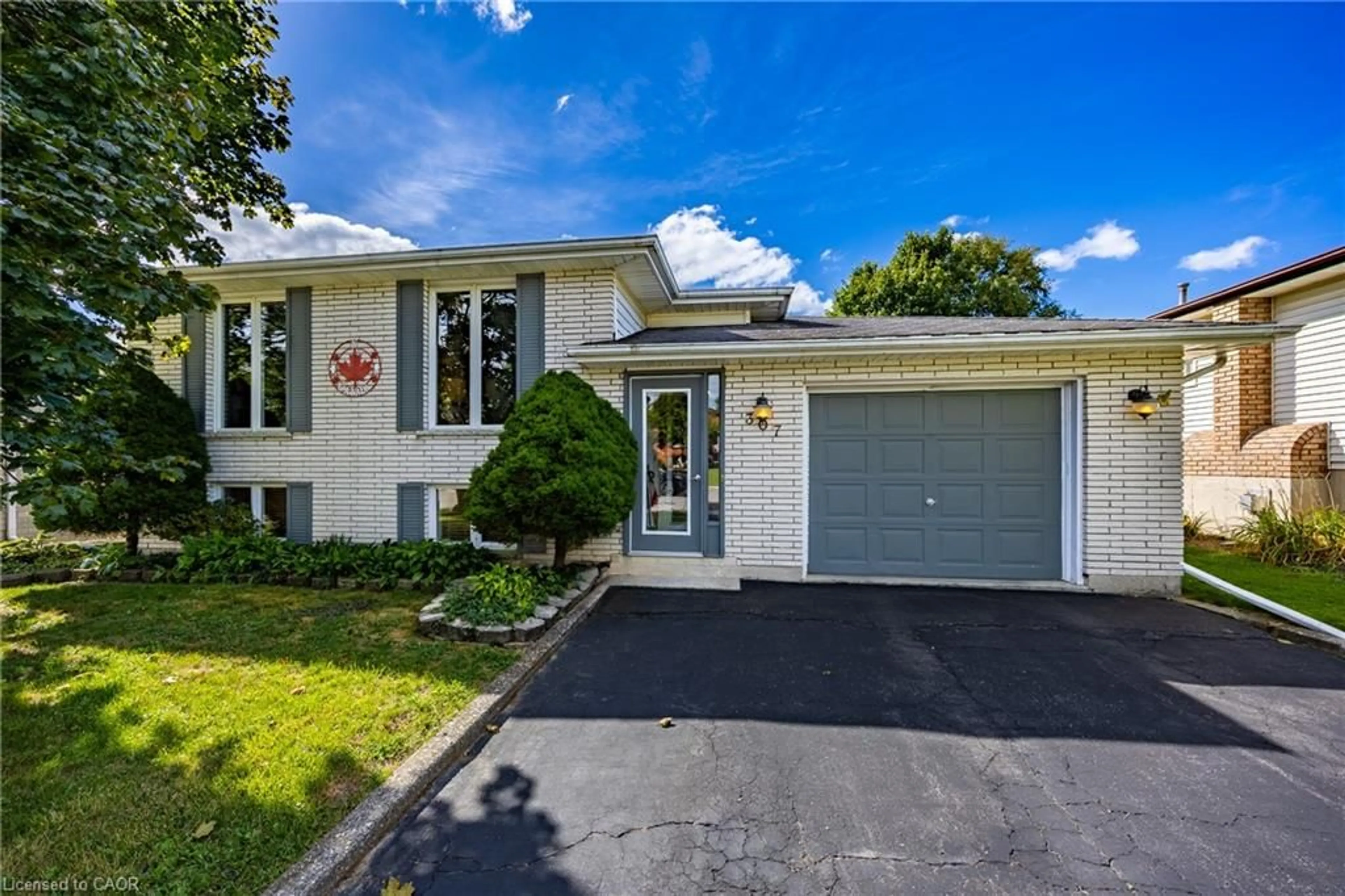 Home with vinyl exterior material, street for 307 Dover Ave, Port Dover Ontario N0A 1N4