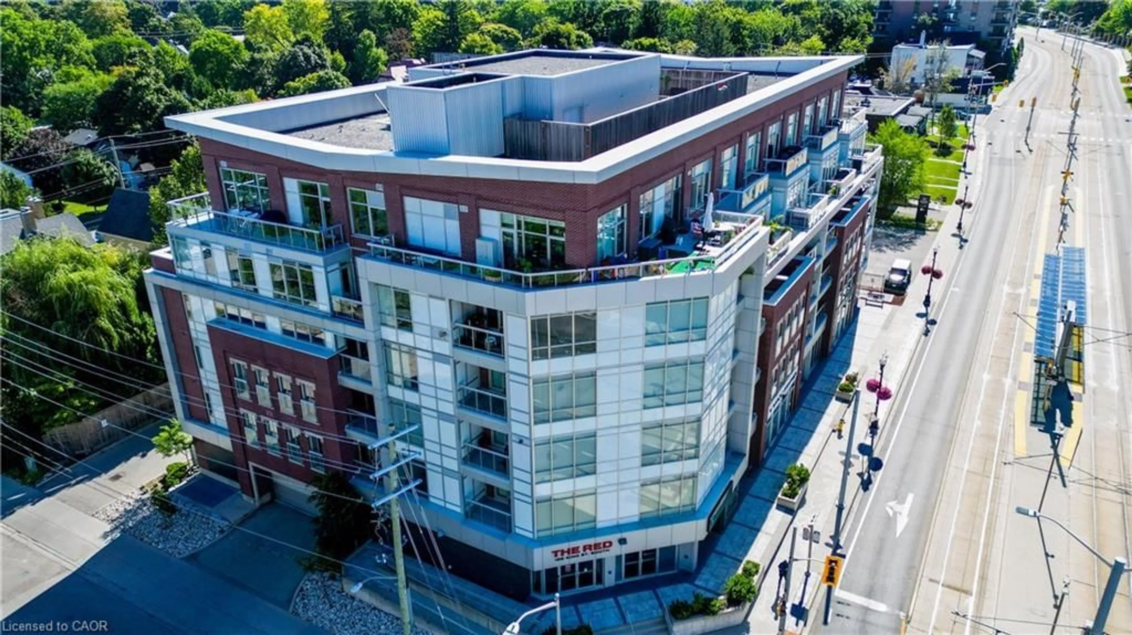 A pic from outside/outdoor area/front of a property/back of a property/a pic from drone, city buildings view from balcony for 188 King St #402, Waterloo Ontario N2J 0C6