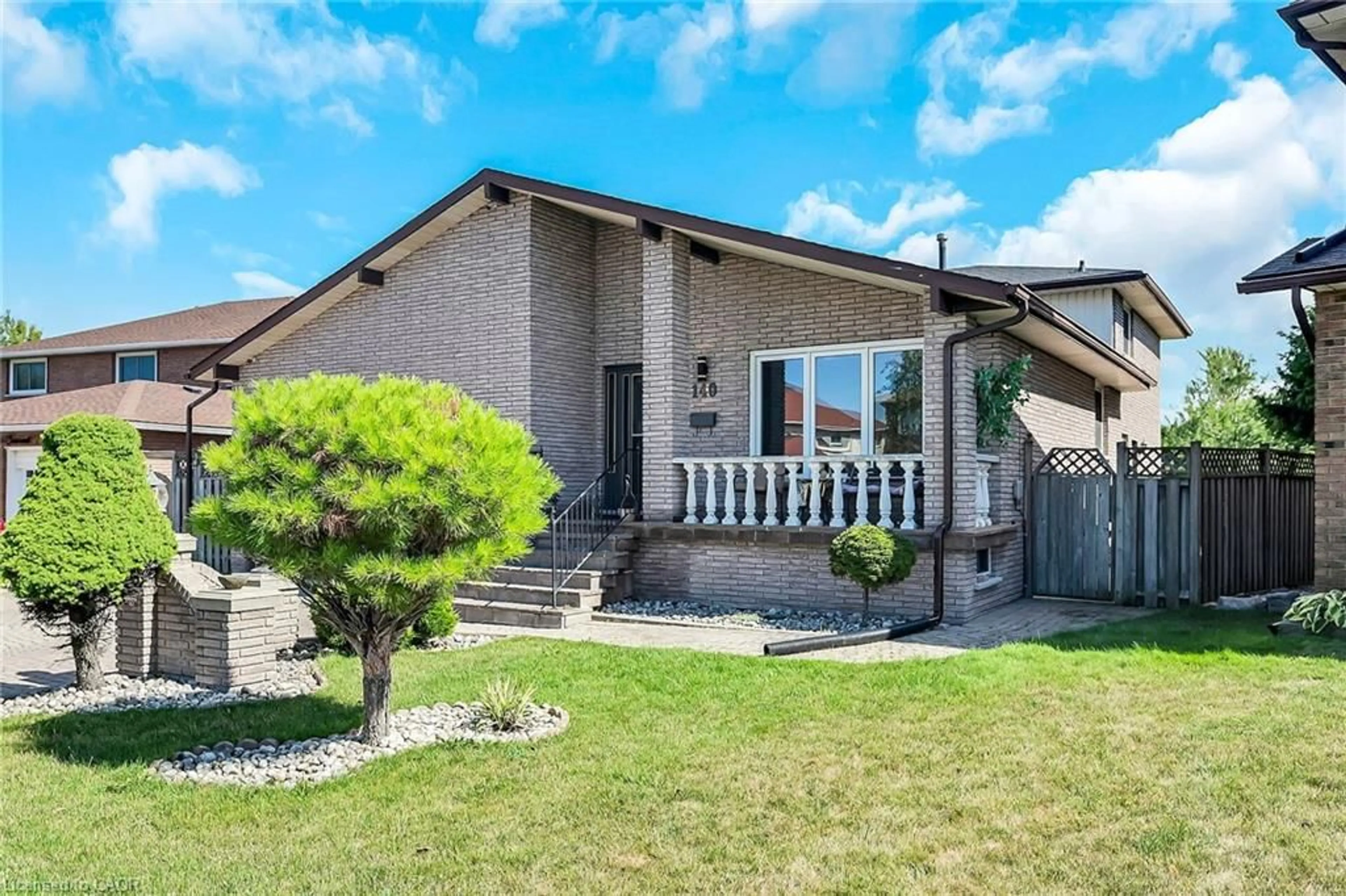 Home with brick exterior material, street for 140 Solomon Cres, Hamilton Ontario L8W 2G7