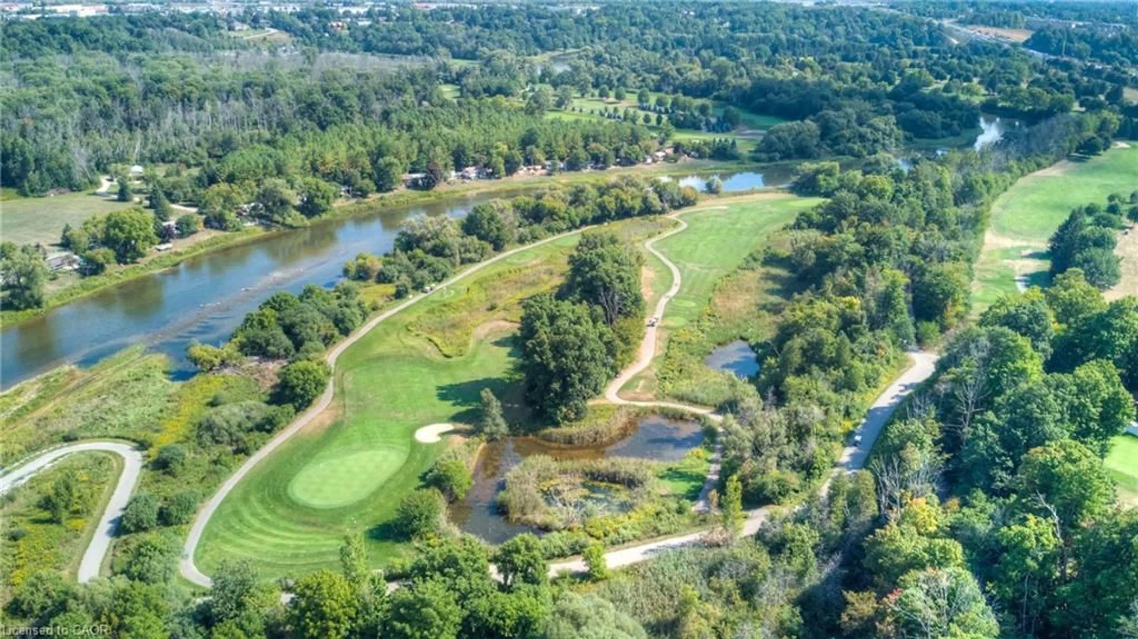 A pic from outside/outdoor area/front of a property/back of a property/a pic from drone, water/lake/river/ocean view for 350 Doon Valley Dr #11D, Kitchener Ontario N2P 2M9