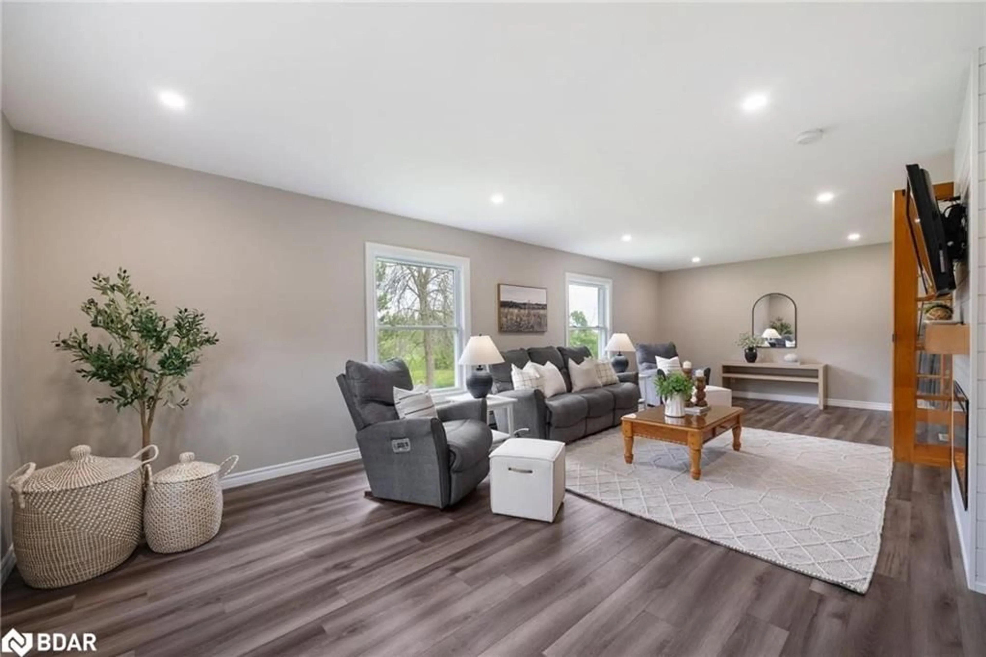 Living room with furniture, wood/laminate floor for 1320 Heights Rd, Lindsay Ontario K9V 4R3