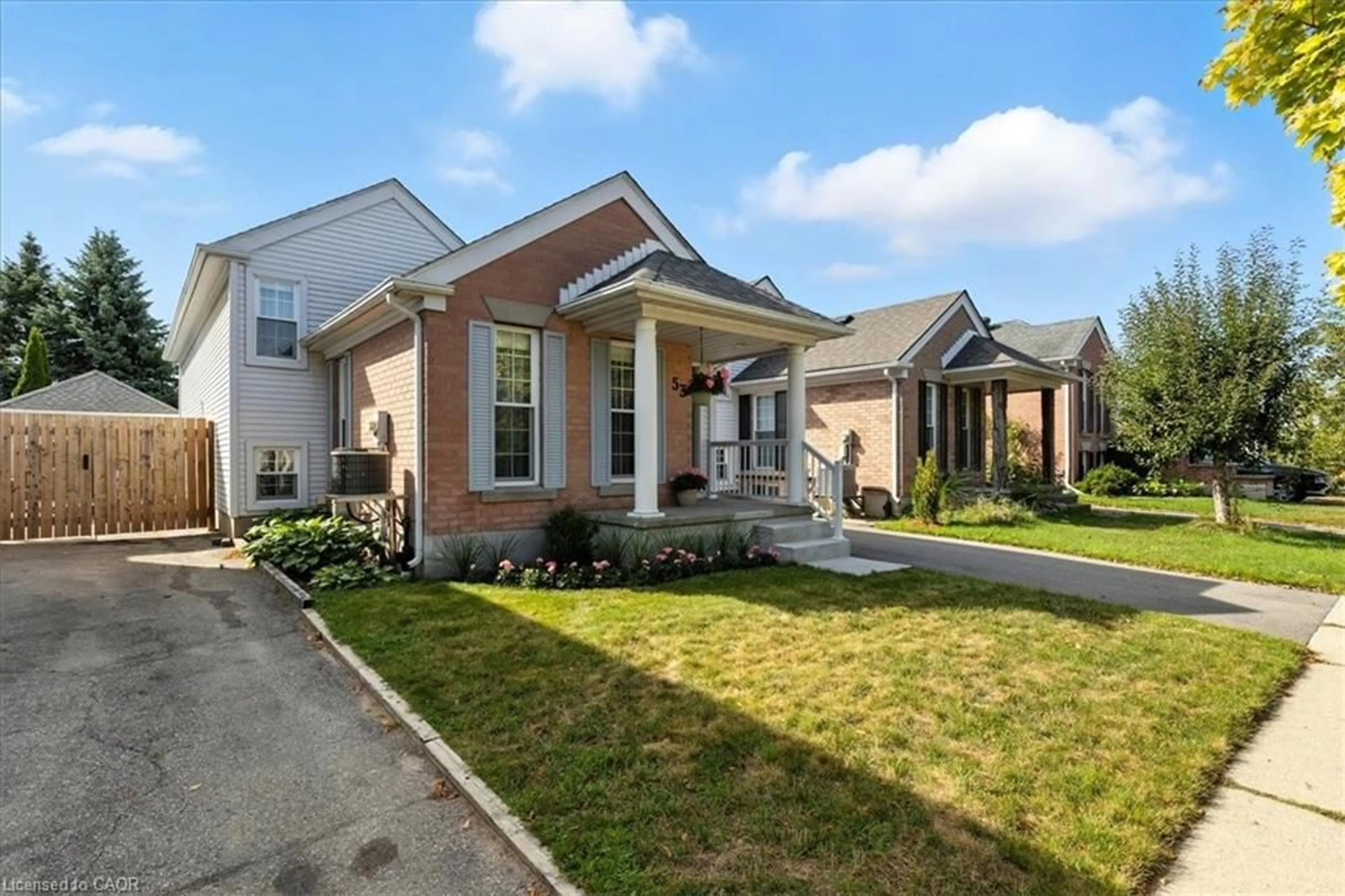 Home with brick exterior material, street for 53 Wake Robin Dr, Kitchener Ontario N2E 3L4